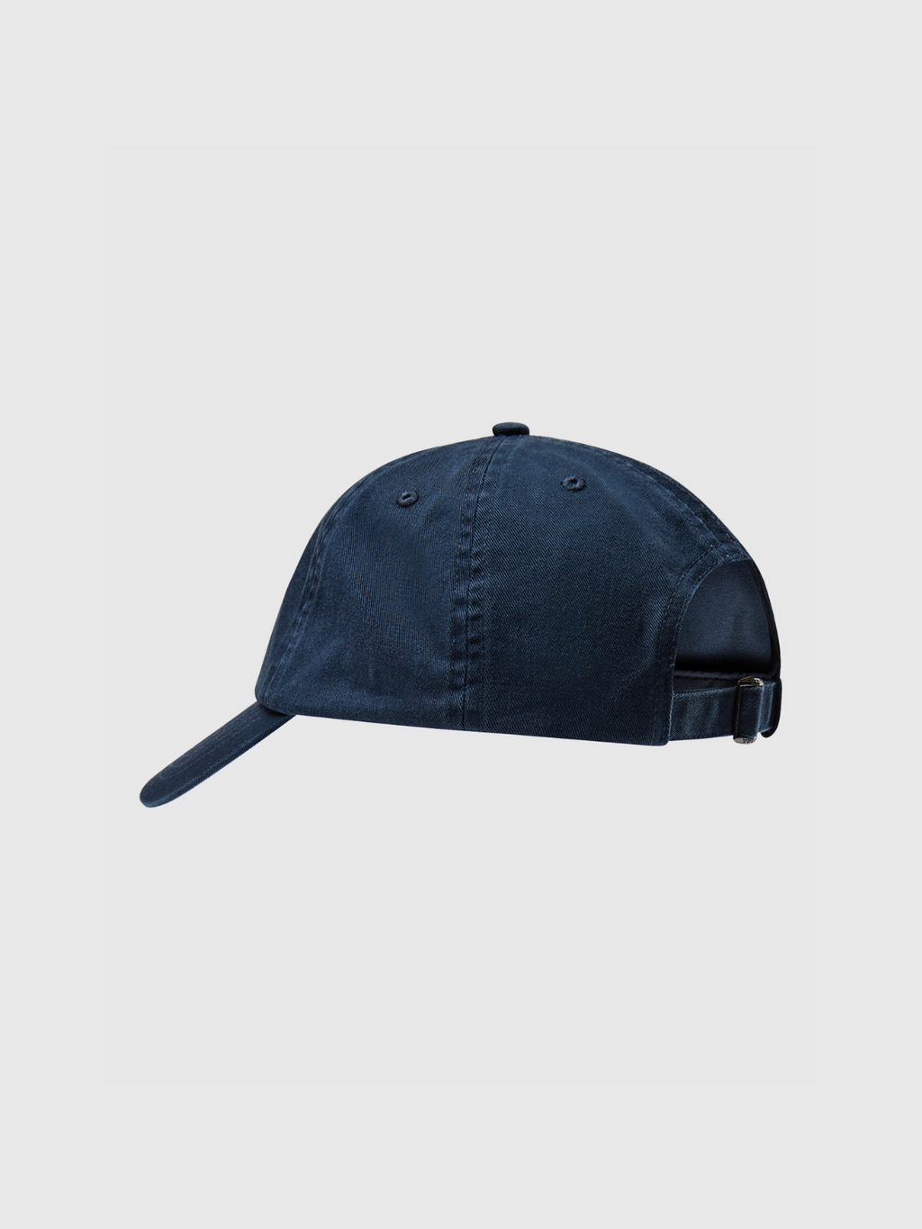 The Gabba Cap - Navy Blazer by Gabba is shown from the side, highlighting its curved brim, detailed stitching, and adjustable buckle strap at the back. The cap stands out against a light gray background.