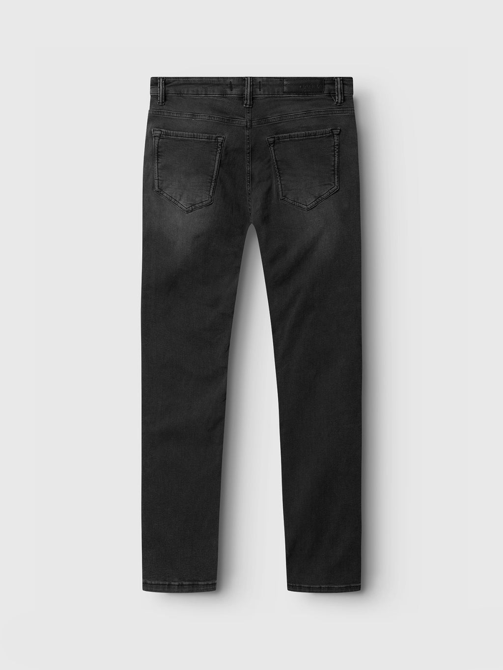 Laid flat, the Jones K3459 - Grey Denim by Gabba showcases two back pockets and straight legs. The super-stretch fabric ensures comfort, featuring a worn look with slight fading around the pockets. The background is plain light gray.