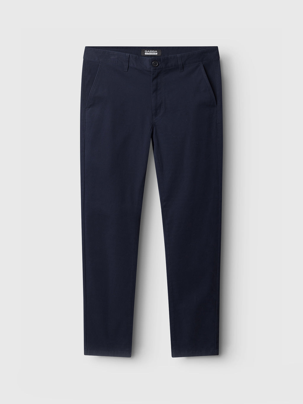 The Venza Chino in navy by Gabba features a classic dark blue with a button and zip closure, side pockets, and a slightly tapered leg on a light gray background—an essential staple for any mens wardrobe.