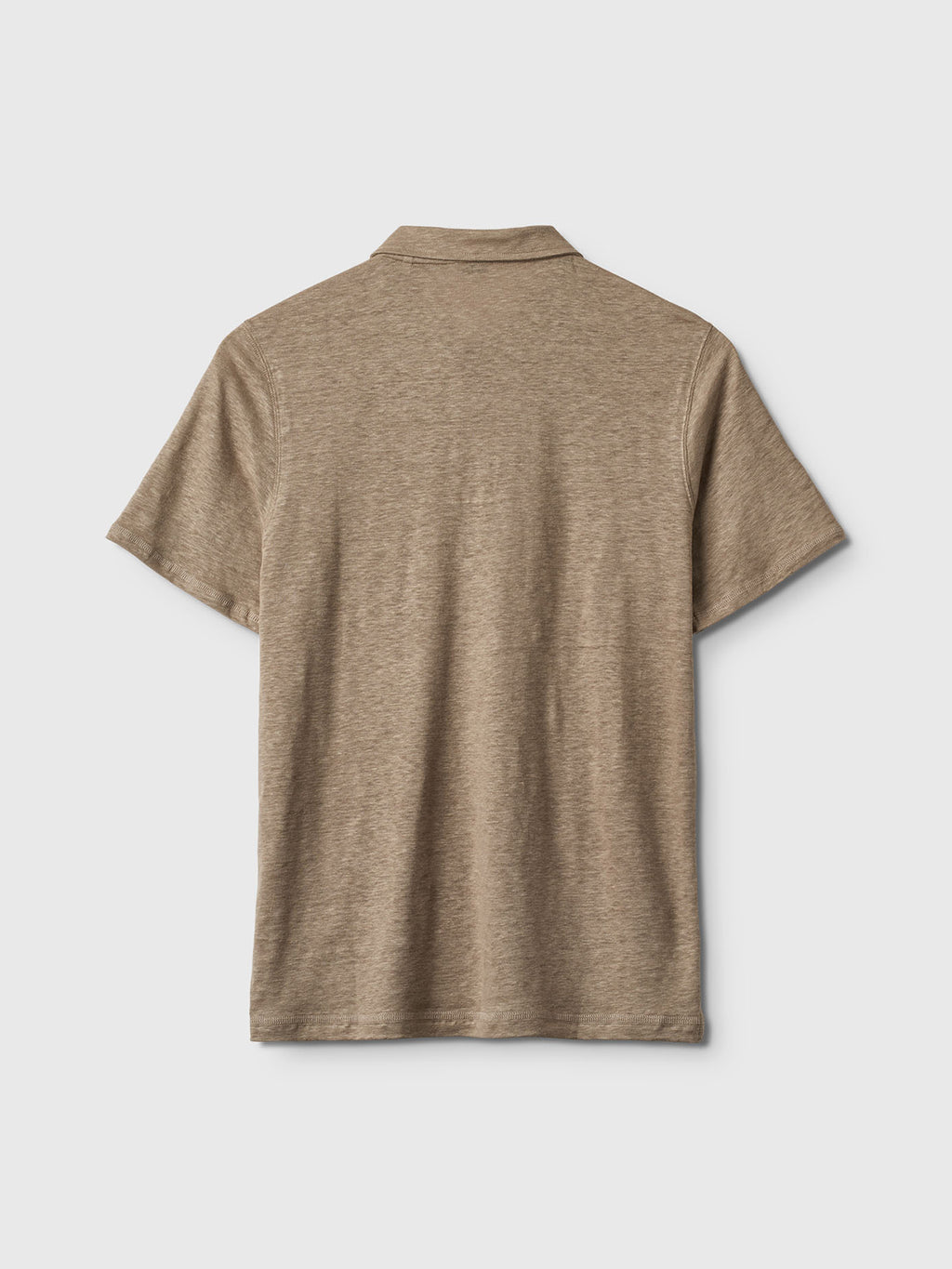 Back view of the Duke Linen Polo SS - Coriander by Gabba, made from high-quality linen. The beige shirt features short sleeves and a minimalist design with no logos or patterns against a plain white background, achieving a modern fit.