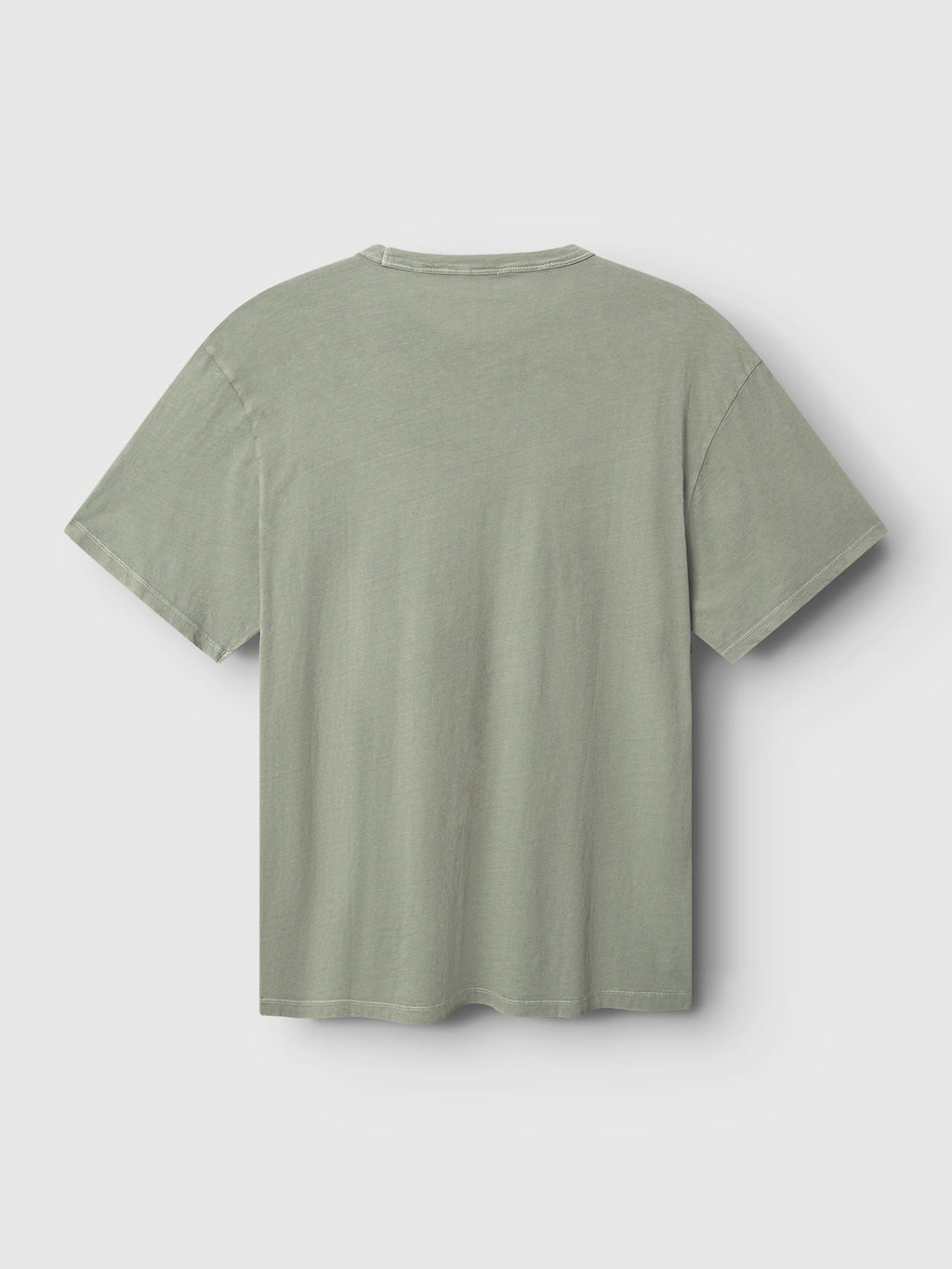 The Lagos SS - Green Sea by Gabba is a sage T-shirt with a comfy round neckline and short sleeves, shown on a white background. The back view highlights its classic fit and minimalistic design, focusing on the soft fabric texture.