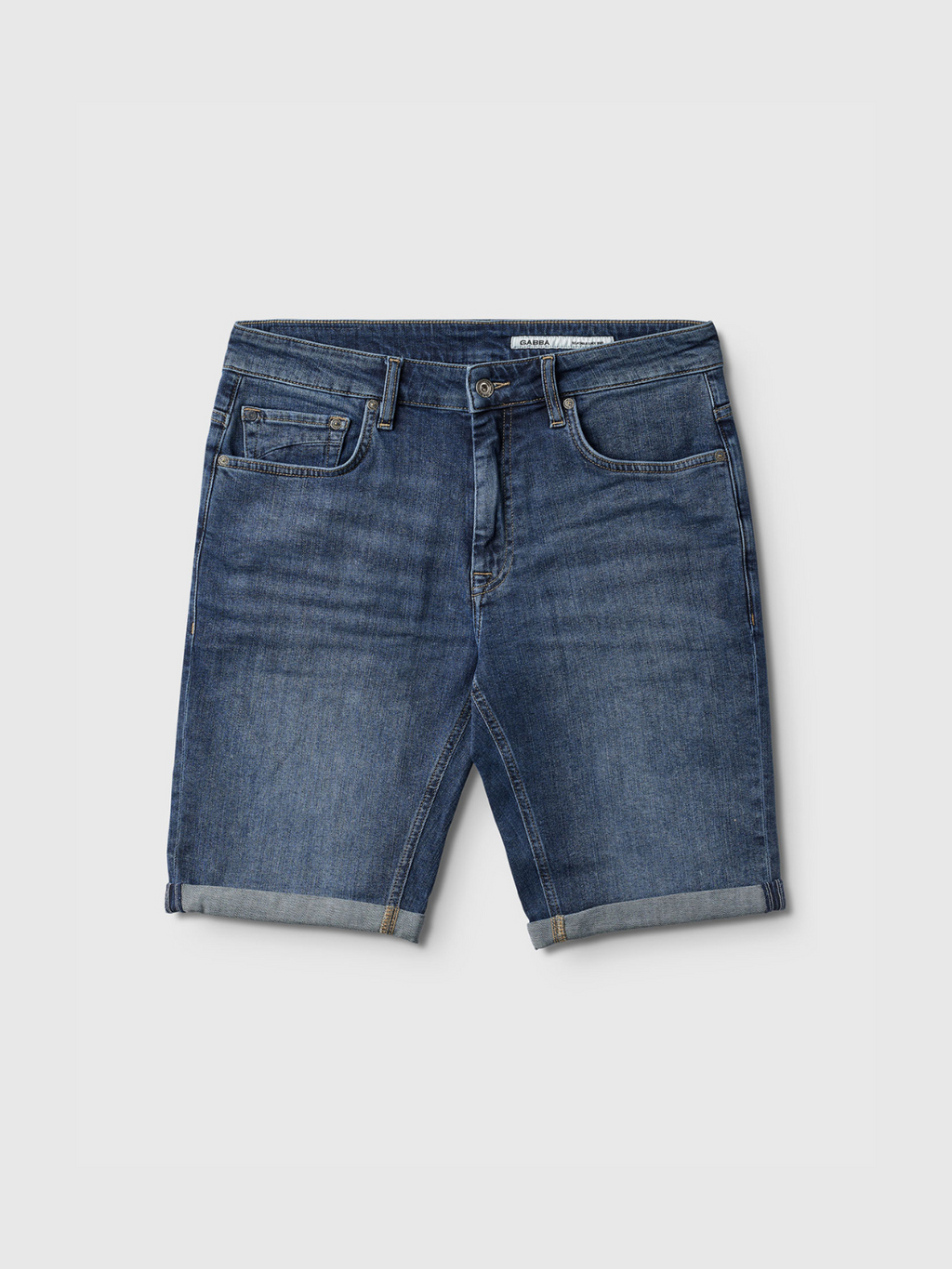 The Gabba Markus K4664 Shorts in mid blue denim feature rolled-up hems, a comfortable fit, front and back pockets, belt loops, and a button and zipper closure, shown laid flat on a white background.