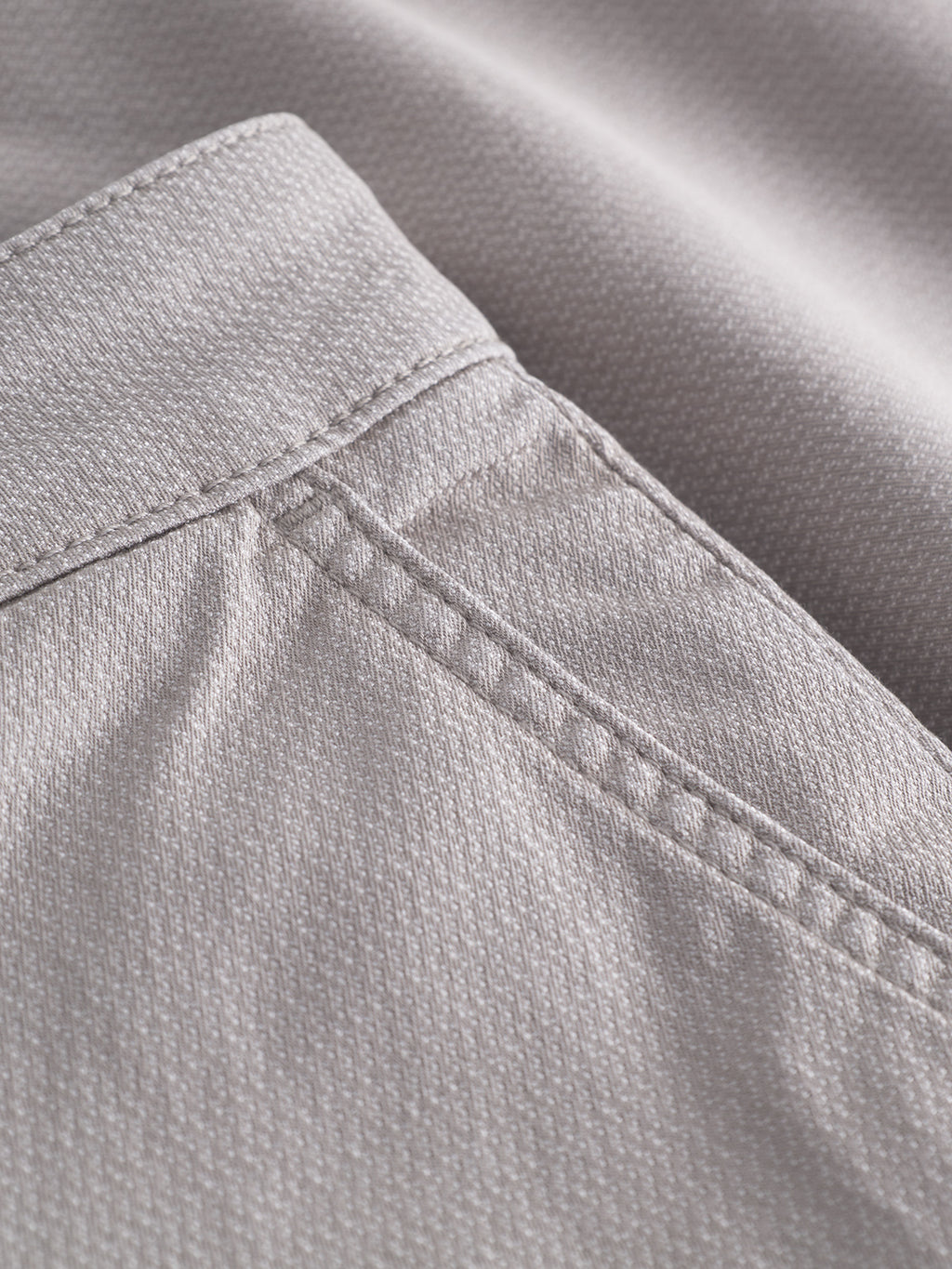 Close-up of the textured beige fabric with a seam and pocket edge with neat stitching, highlighting the timeless appeal of Gabbas Jet K3280 Dale Shorts in Grey Paloma, ensuring both style and comfort.