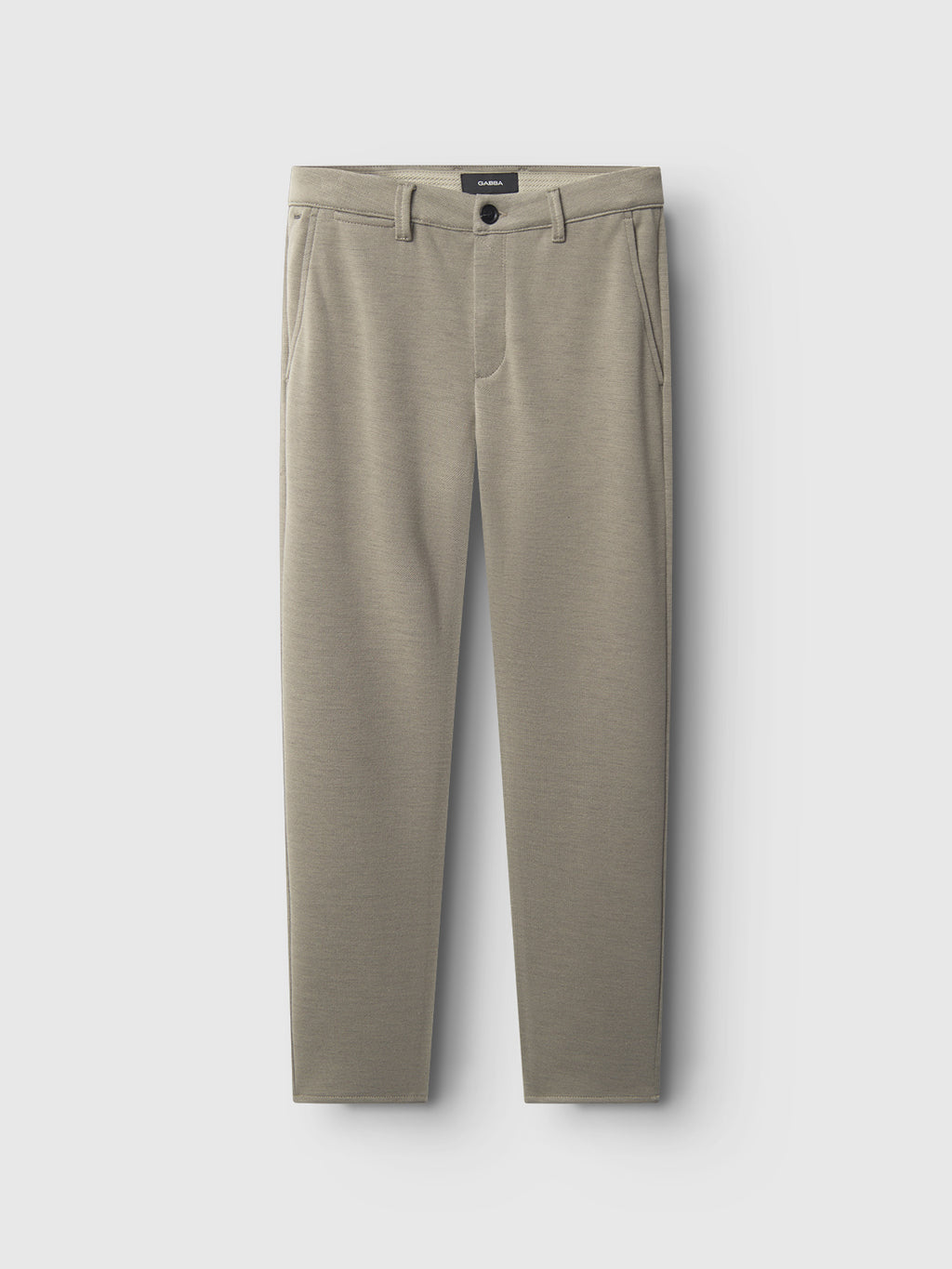 The Gabba Paul GKnit pants in light green feature belt loops, side pockets, and a slim fit in structured fabric for a polished look, shown on a plain light background.