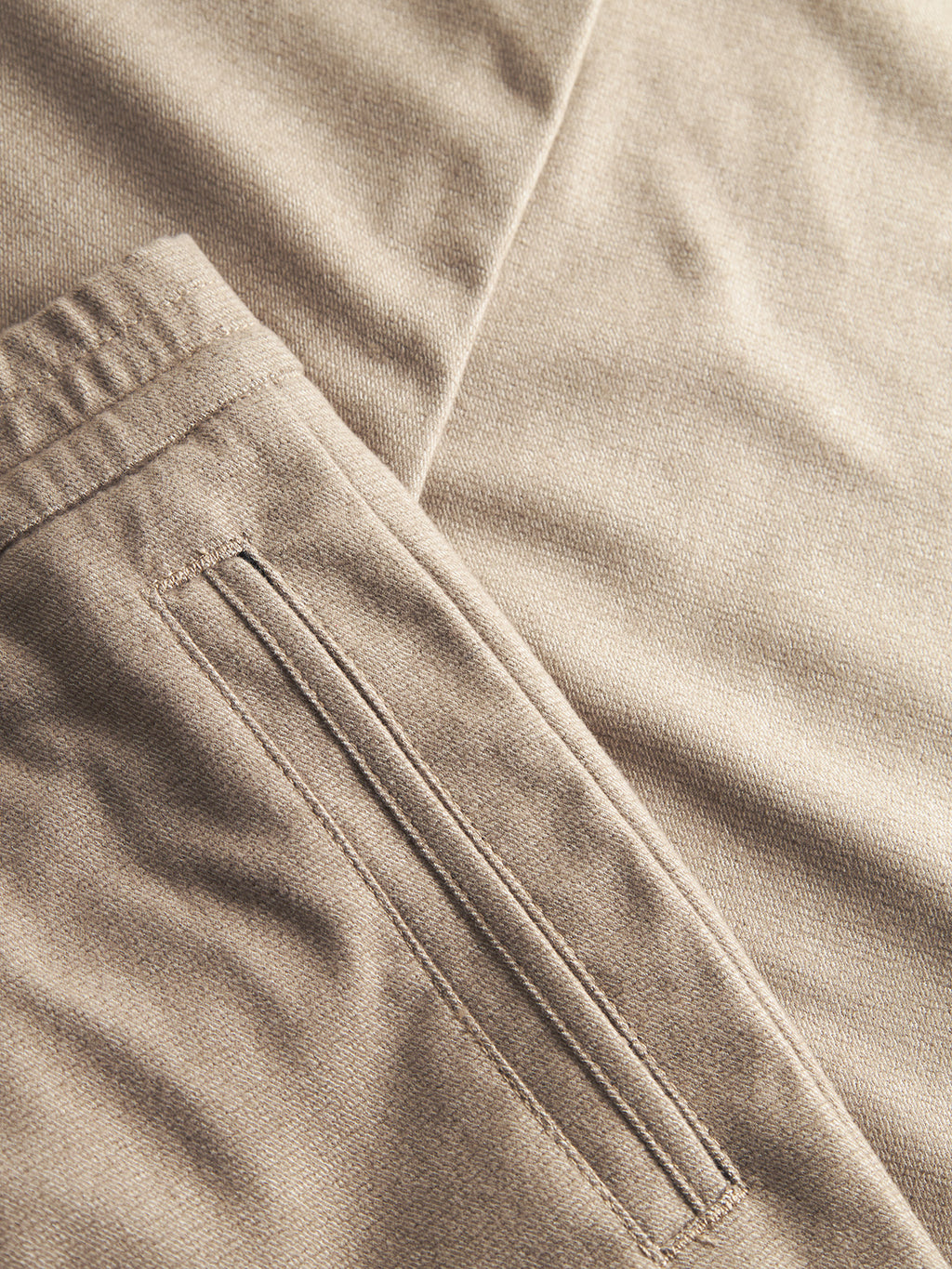 Close-up of Gabba Monza Shafi - Brown joggers, highlighting the side pocket, waistband with visible stitching, soft brushed cotton texture, and relaxed straight fit.