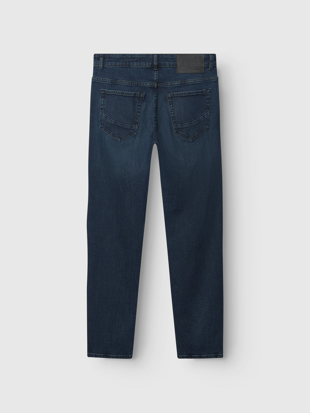 The Gabba Marc Mego - Dark Blue Denim jeans are shown from the back with two rear pockets, a black leather waistband patch, and straight legs made with Wiser Wash technology, set against a plain light gray background.