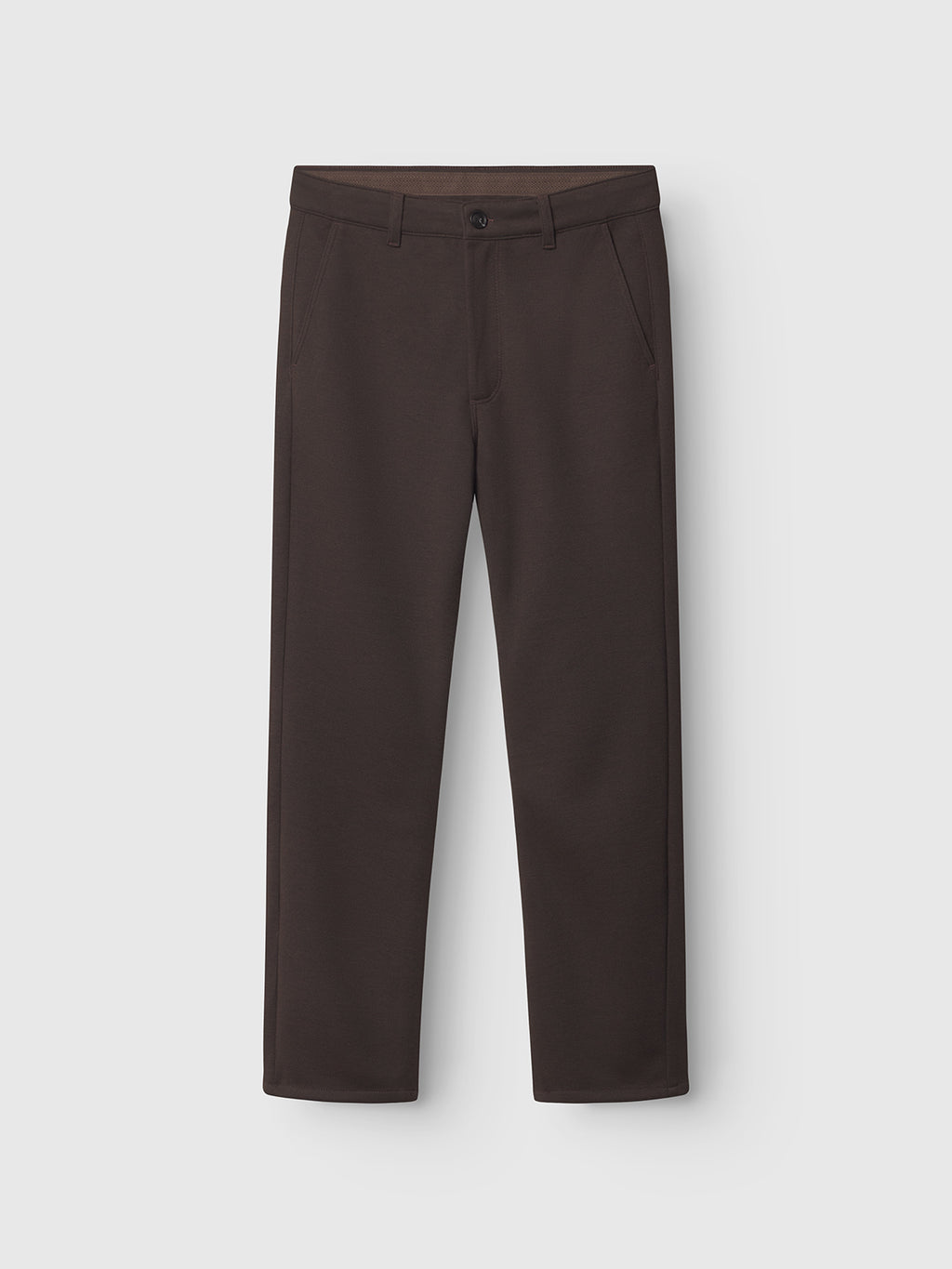 On a white backdrop, the Gabba Venza GKnit - Brown trousers showcase a button closure, belt loops, and side pockets. Crafted with structured fabric using an advanced knitting technique, these straight-fit pants provide a smooth yet subtly textured feel.