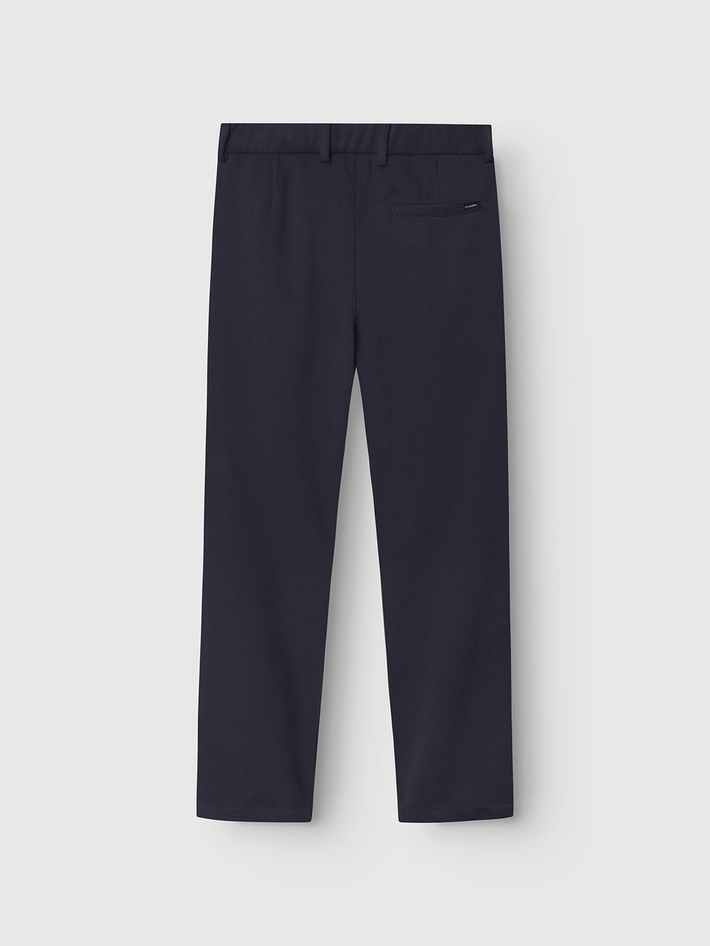 The navy Tito GKnit pants by Gabba are viewed from the back against a white background, featuring belt loops and a single back pocket, with a knit structure ensuring comfort.