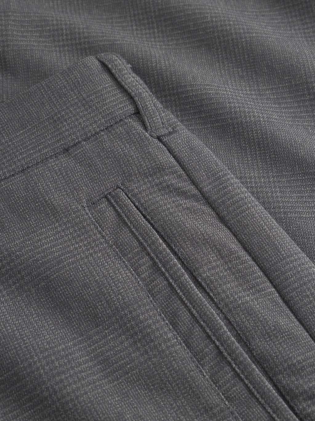 Close-up of the Gabba Napoli 19 Field - Grey trousers, highlighting the plaid pattern with a focus on the front pocket and waistband, showcasing its texture and detailed stitching that emphasize comfort and craftsmanship.