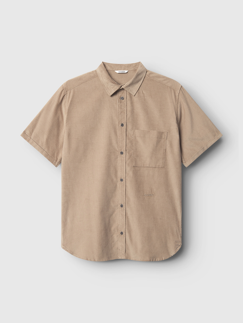 The Gabba Sven Reg Cord SS in Sand Greige is a premium short-sleeve button-up shirt with a pointed collar and single chest pocket, crafted from soft cotton and displayed flat on a light gray background.