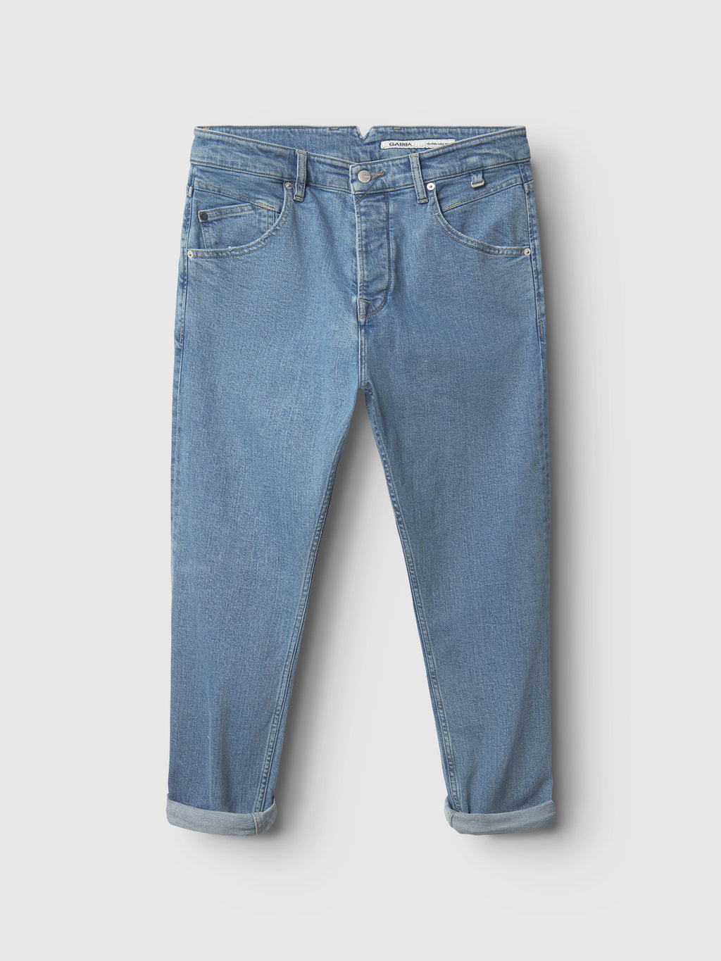 The Gabba Alex Cross Lt. Blue Denim jeans feature a classic five-pocket design, button and zip closure, relaxed crotch, and rolled cuffs, shown flat on a white background for an effortlessly stylish look.
