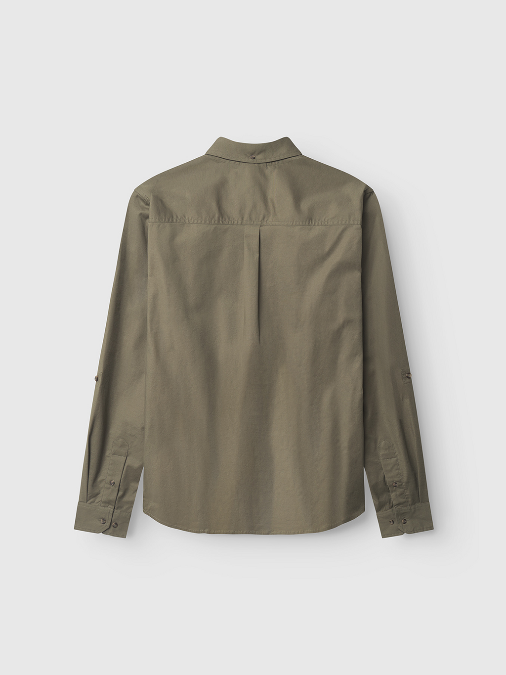 Back view of a Gabba Bent Reg Ox LS shirt in Army against a light gray background. This timeless design features button cuffs and a yoke seam across the shoulders, promising all-day comfort.