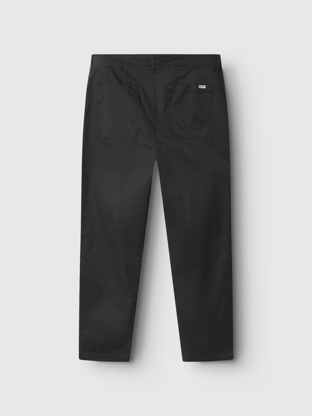 The Joe Unite - Black pants by Gabba are displayed against a white background, showcasing a classic design with two back pockets and tapered legs for a casual look. View is from the back.
