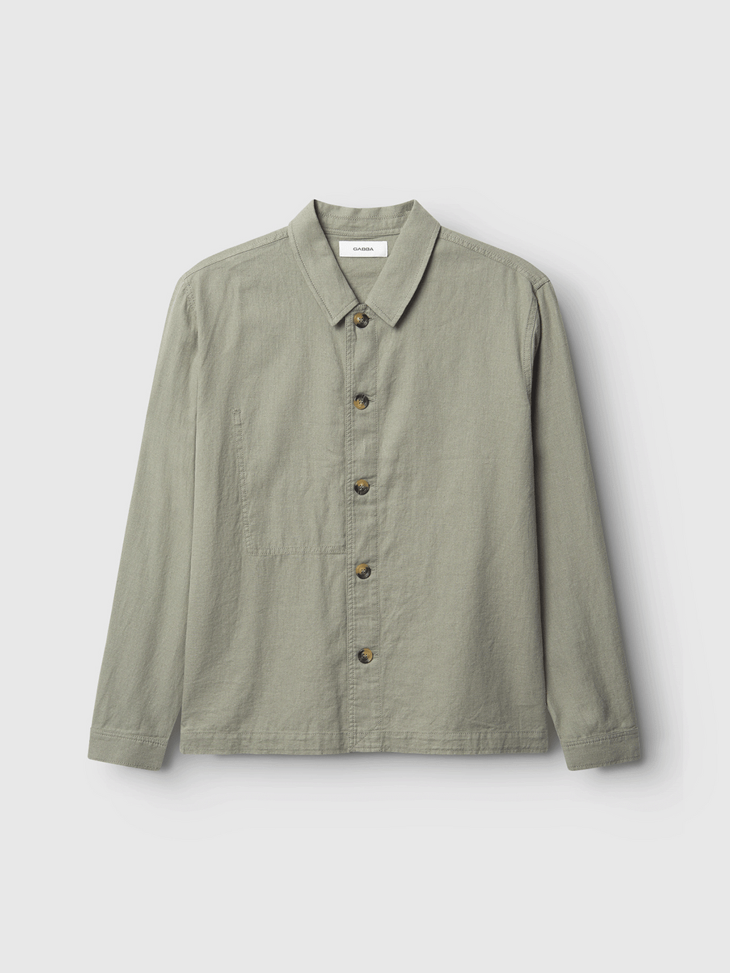 The Gabba GABpeter Lino is a light green, long-sleeve cotton overshirt with a collar and chest pocket, shown on a plain white background.