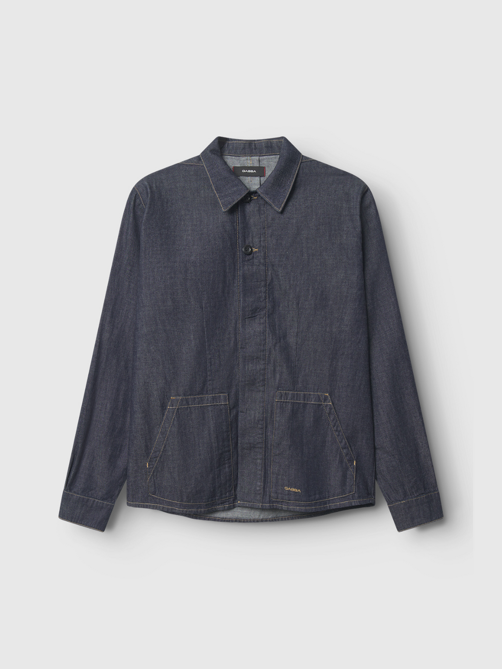The Gabba Jap Beam - Dark Blue Denim jacket, made from premium cotton selvage, features a collar, long sleeves, front button closure, and two large front pockets. Displayed against a plain light background.