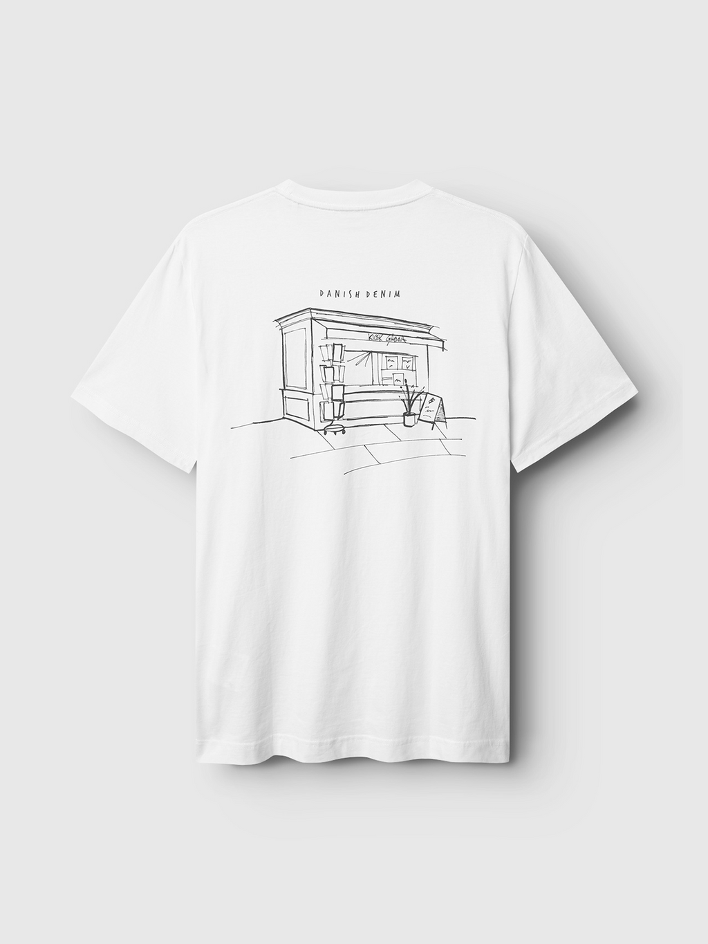 The Gabba Dune Kiosk A SS GOTS - White is an organic cotton t-shirt with a minimalist storefront and outdoor seating line drawing on the back, topped with the text DANISH DENIM.