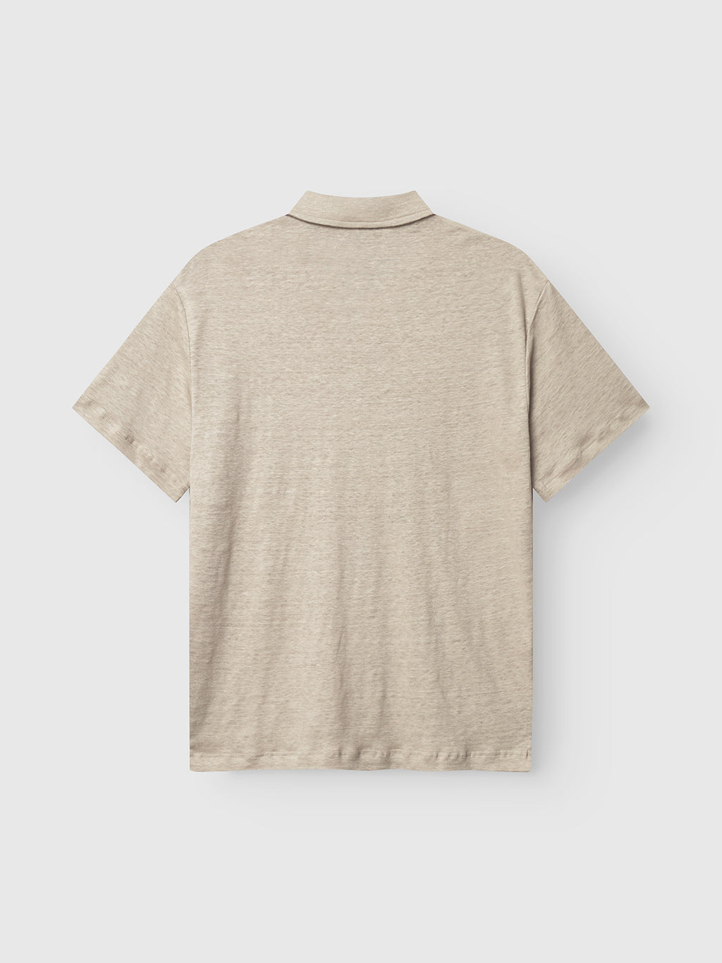The Trevor - Sand Plaza by Gabba is a beige short-sleeve polo shirt, designed for superior comfort with textured fabric, shown flat against a simple light backdrop, highlighting the back view.