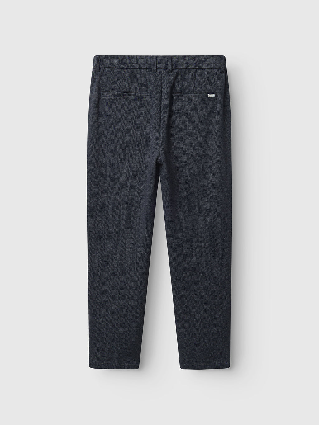The rear view of Gabbas Monza Tweed Navy pants on a plain white background features belt loops, two back pockets, and a small label on the right pocket, showcasing an elegant tweed design for a sophisticated look.
