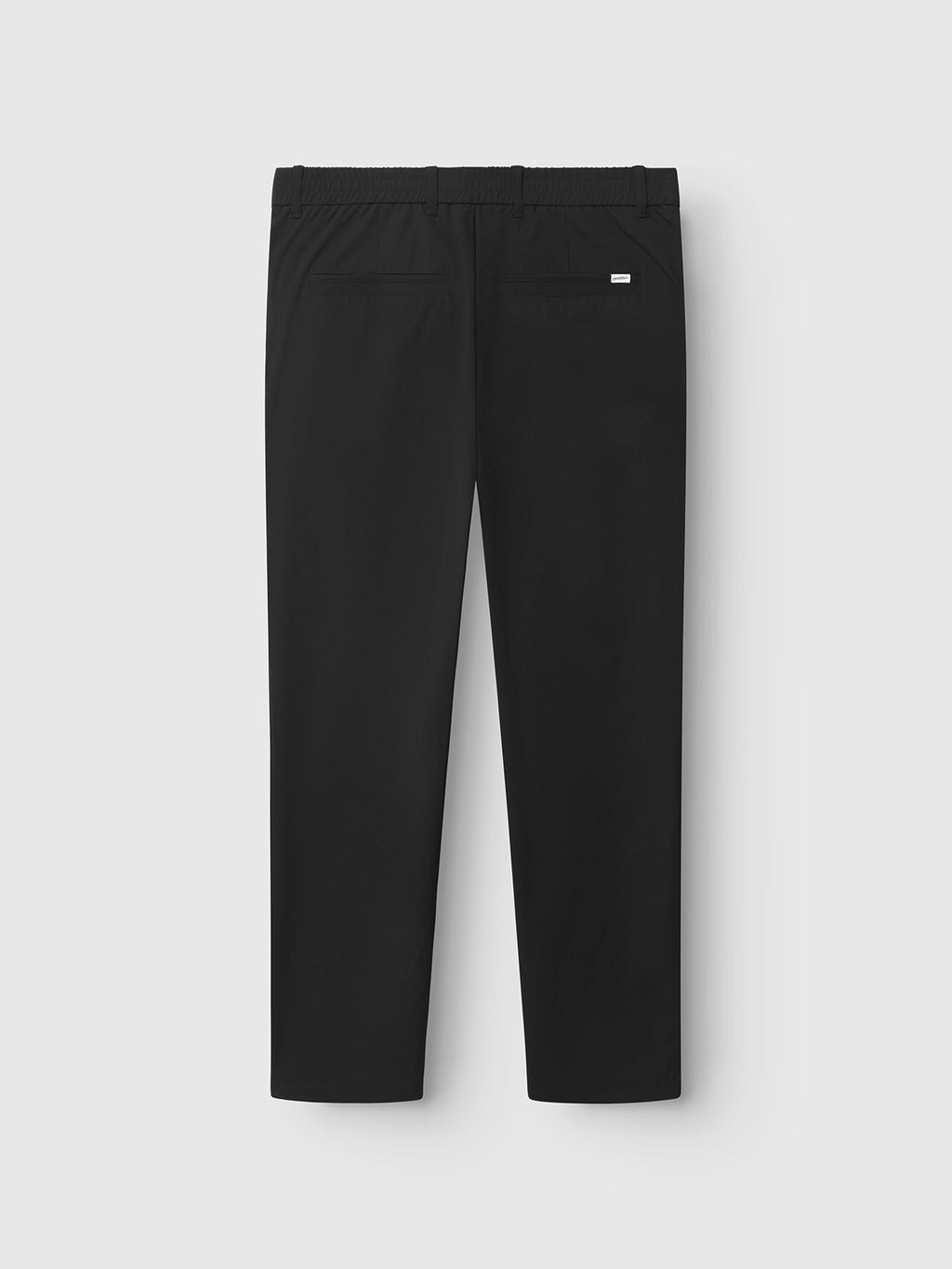 Gabbas Monza Tech - Black pants feature a relaxed straight fit, an elastic waistband, and tech fabric for comfort, with a subtle logo tag on the back right side. These versatile pants include two back pockets and are showcased on a plain white background.