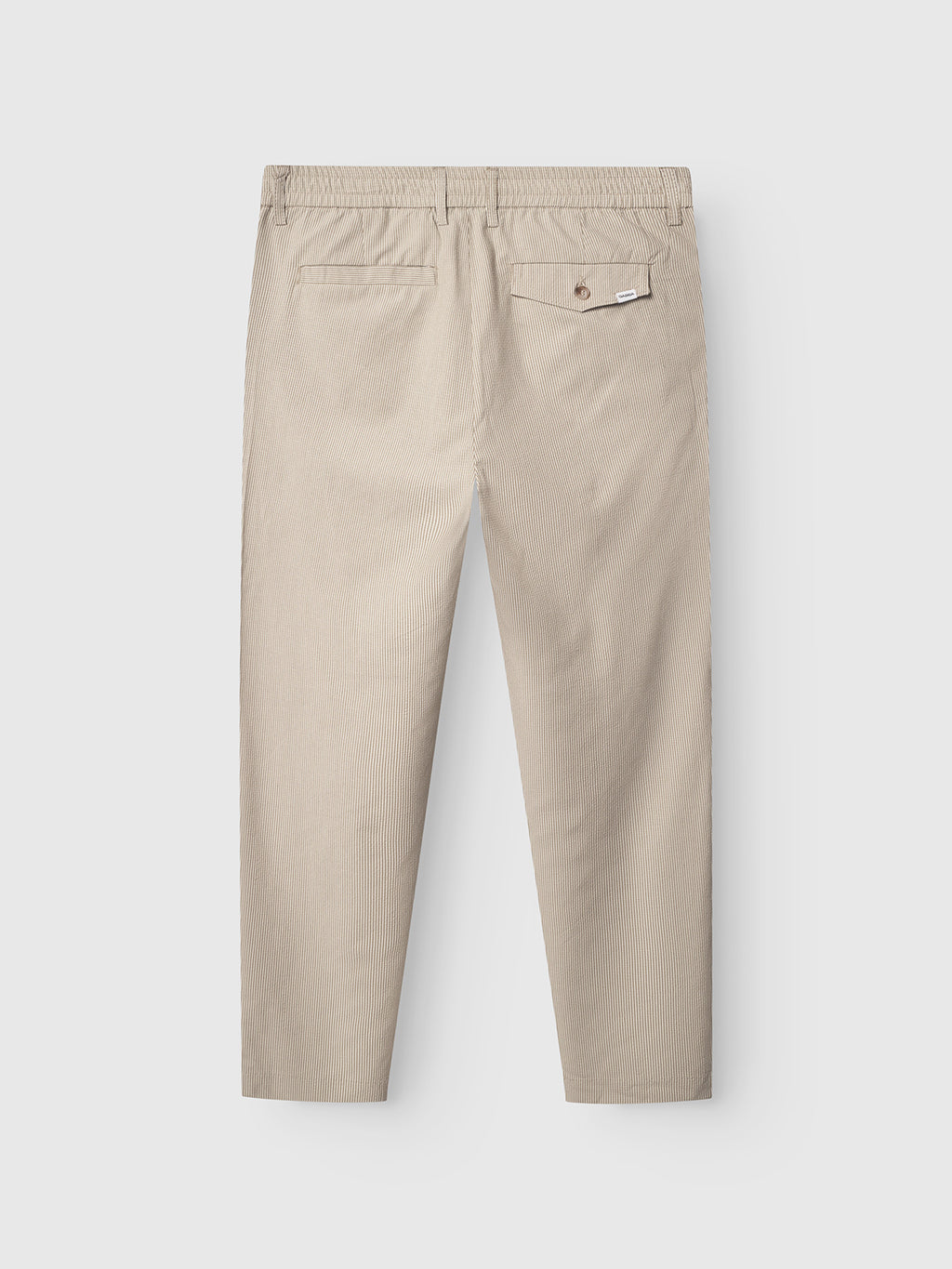 Gabba Monza Button Com2 Cropped pants in khaki, shown from the back. Features: elastic waist for comfort, two back pockets (one with button closure and white tag), straight-leg cut, and a classic silhouette.