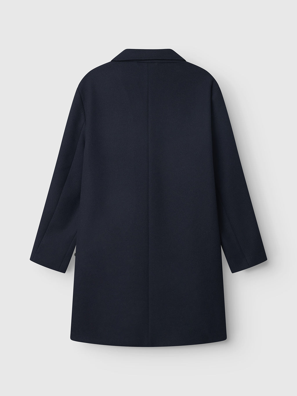 The Gabba Leeds Drift - Navy is a knee-length wool blend coat with long sleeves and a straight back seam, shown against a plain light grey background.