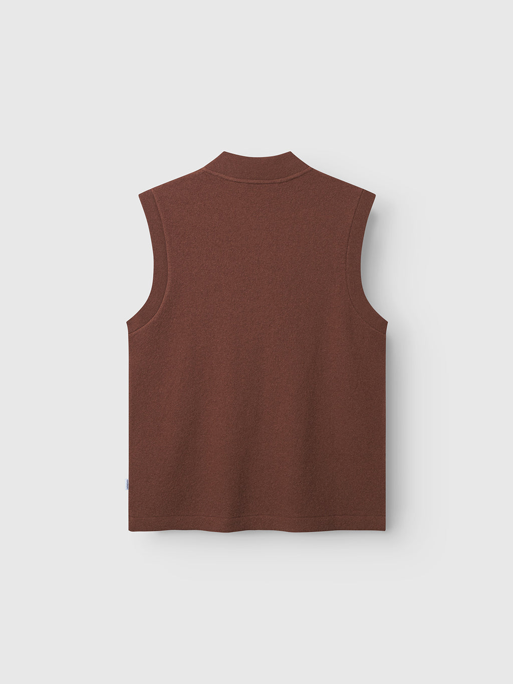 Gabba’s Norwich Led - Brownish vest is sleeveless with a high neckline and straight hem, shown from the back as an ideal layering piece against a plain light gray background.