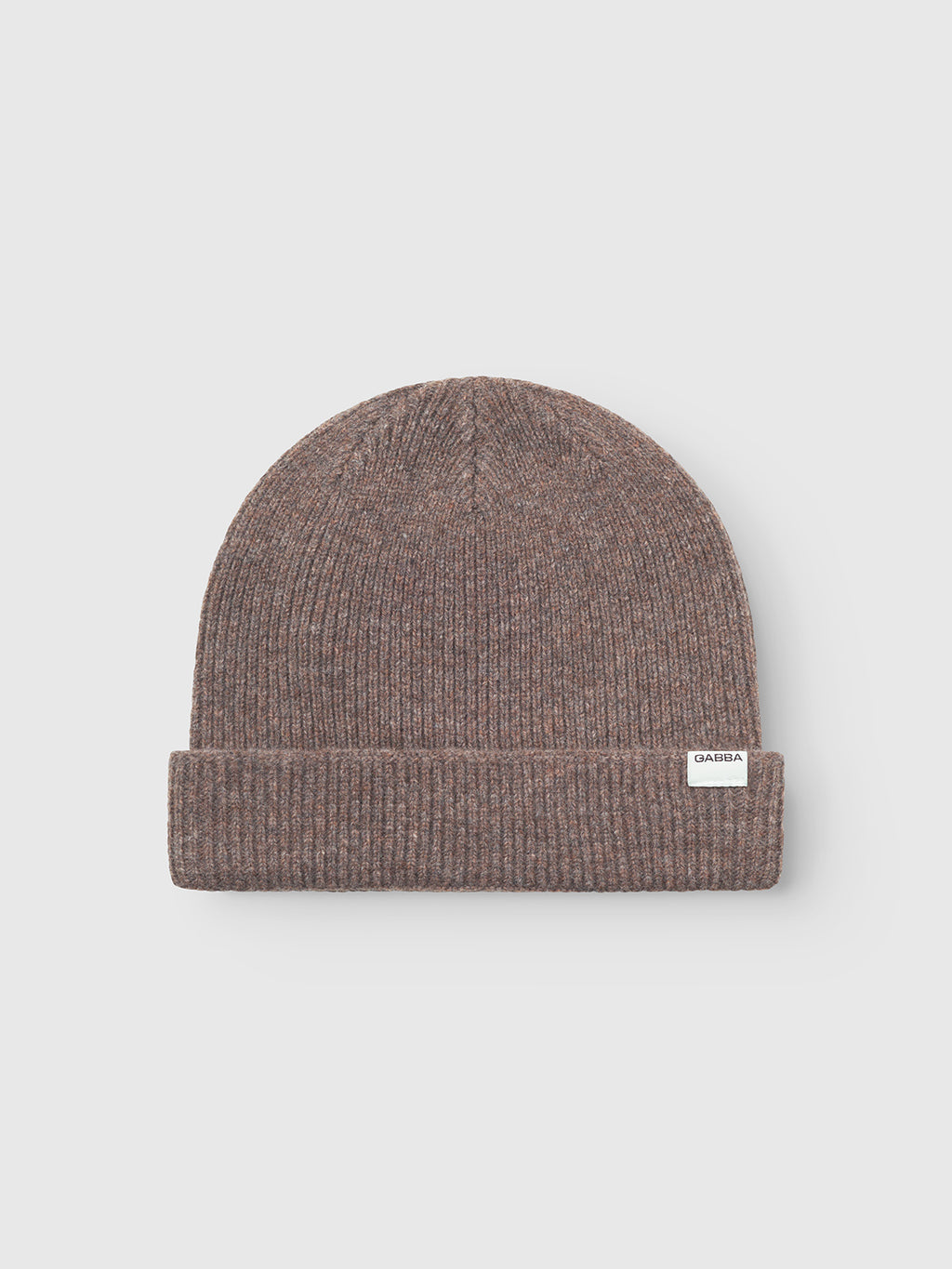 The Gabba Biella Aico - Dk. Brown merino beanie features a ribbed design, folded cuff, and a small white label, shown on a light gray background—ideal for cold-weather outfits.