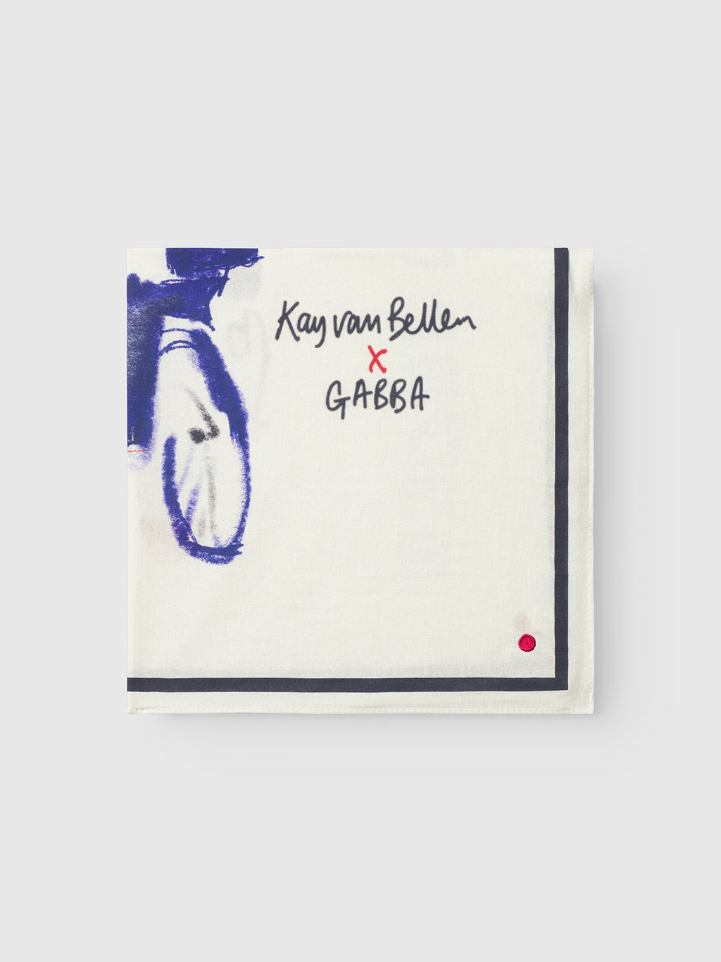 The Bandana Kay - Multi Pattern by Gabba is a white square bandana featuring abstract blue brushstrokes, a black border, a small red dot, and Kay van Bellen x GABBA handwritten on the top right.