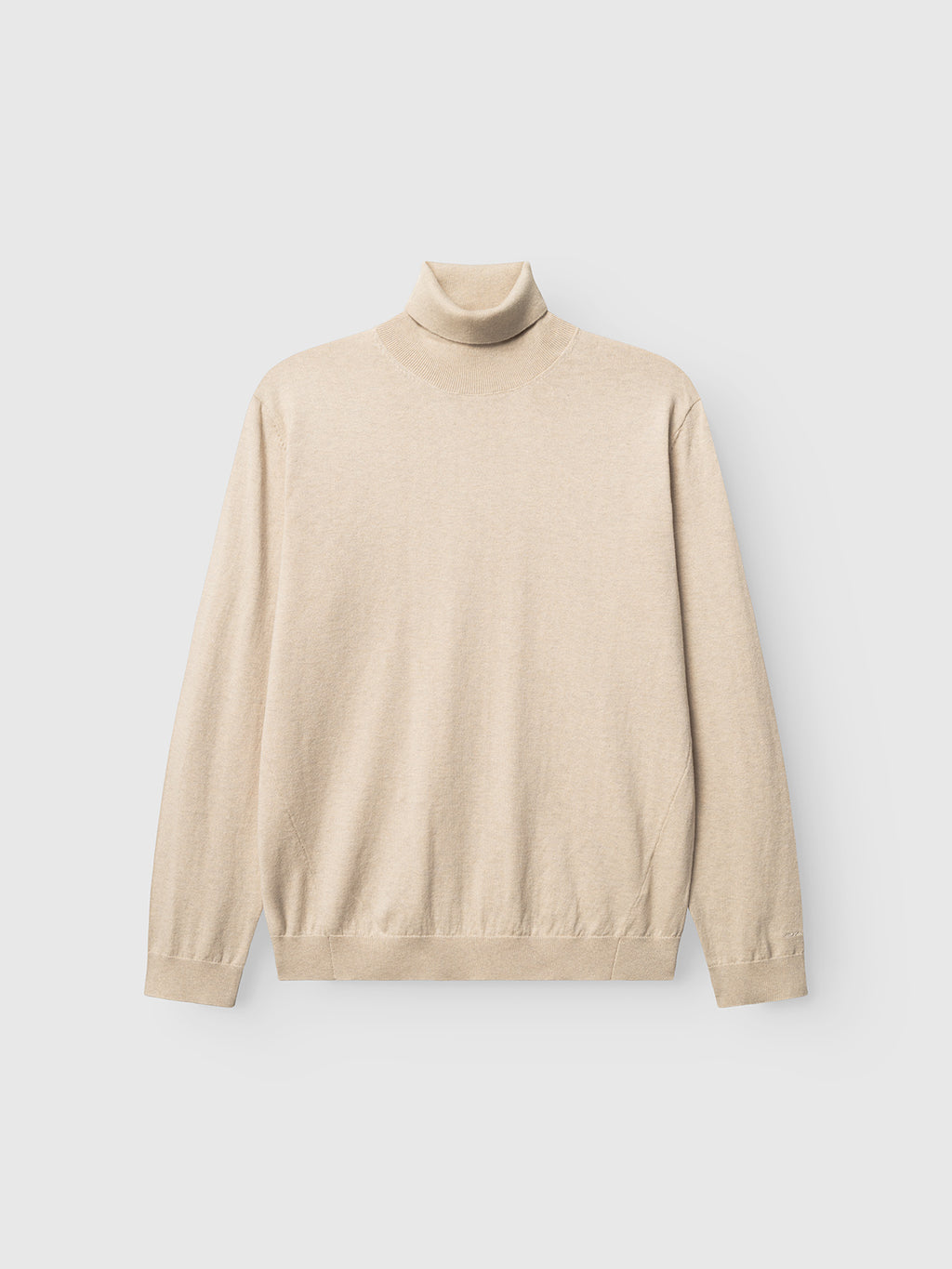 The Aris Prex - Sand sweater by Gabba is a beige, long-sleeve roll neck with ribbed cuffs and hem, relaxed fit, shown laid flat on a white background.