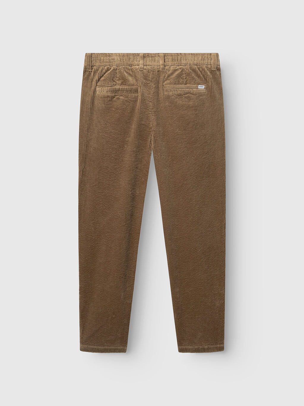 The Monza Ibre - Sand corduroy trousers by Gabba are shown from the back with two rear pockets and a small white label above the right pocket, displayed on a light gray background for a casual, sophisticated look.