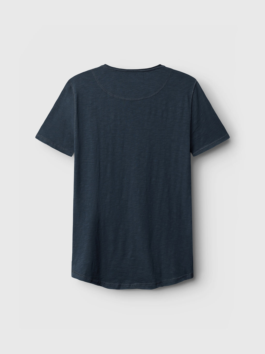 The Konrad Slub S/S Tee by GABBA, in navy, is showcased on a light gray backdrop. This back-view shirt features short sleeves and a round neck, delivering a regular fit for comfort.