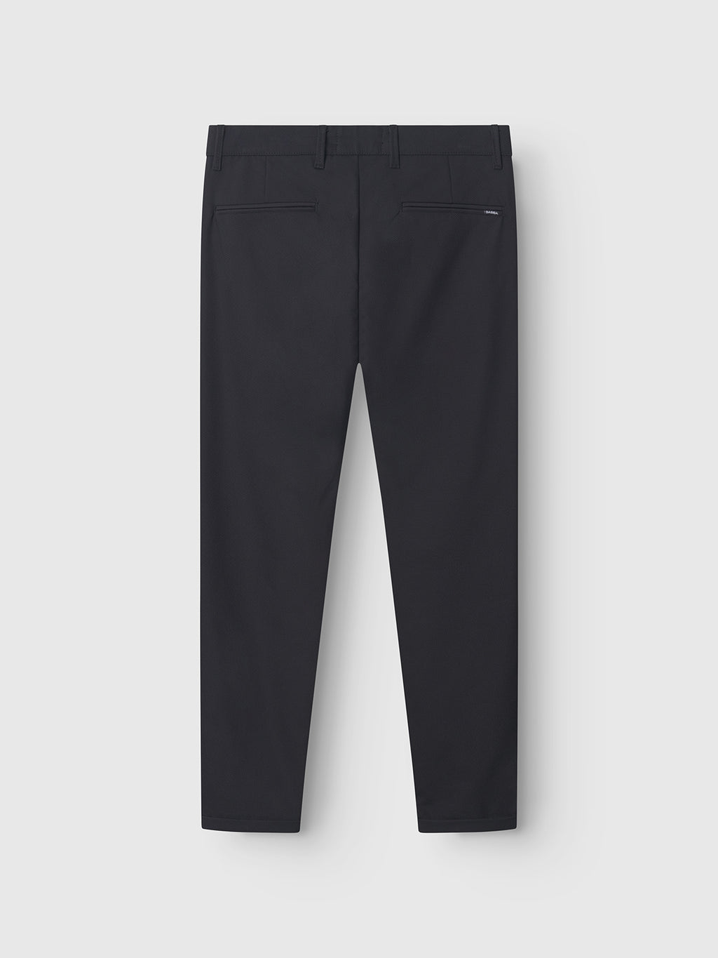 The GABBA Pisa Small Dot - Black dress pants, made from high-stretch cotton-blend fabric, feature two back welt pockets and belt loops. Shown from the back against a light gray background.