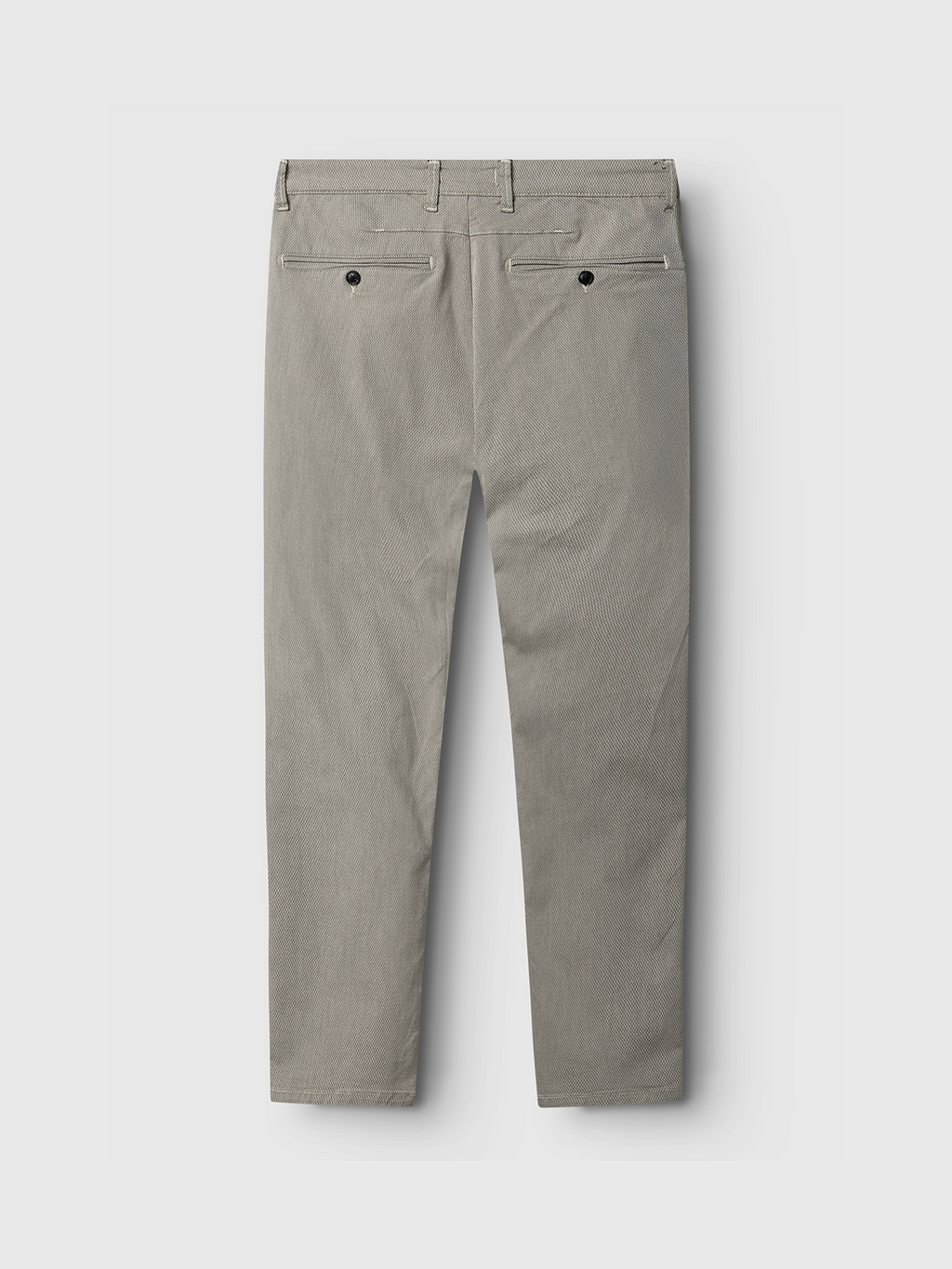 Shown from the back, the Gabba Paul K3280 Dale Chino in Birch features a light gray slim fit, two welt pockets with branded buttons, and belt loops at the waistband, displayed on a plain light background.
