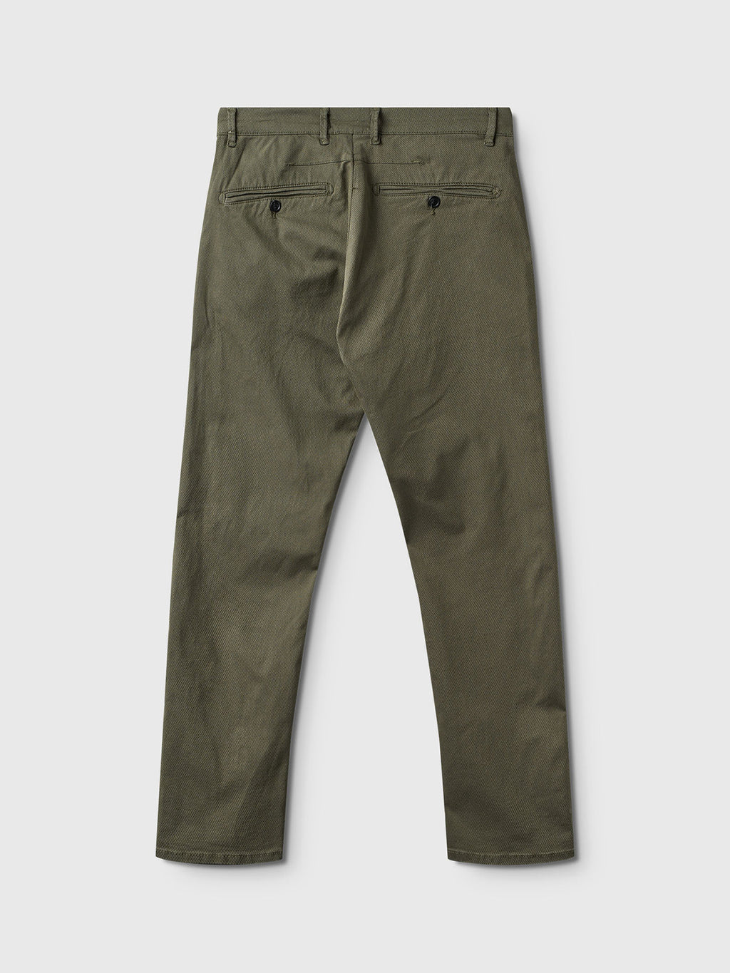 The Paul K3280 Dale Chino by Gabba, in Deep Lichen Green, is a classic slim fit with belt loops and two rear French pockets with button closures. They have a clean look against a light background.