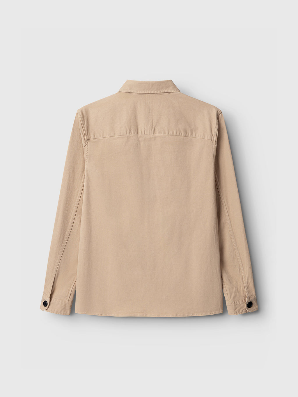 The Topper LS Shirt by GABBA, in humus, is a long-sleeve overshirt seen from the back. It has a classic collar, buttoned cuffs with two visible buttons, and a yoke. Perfect for layering against a plain light background.
