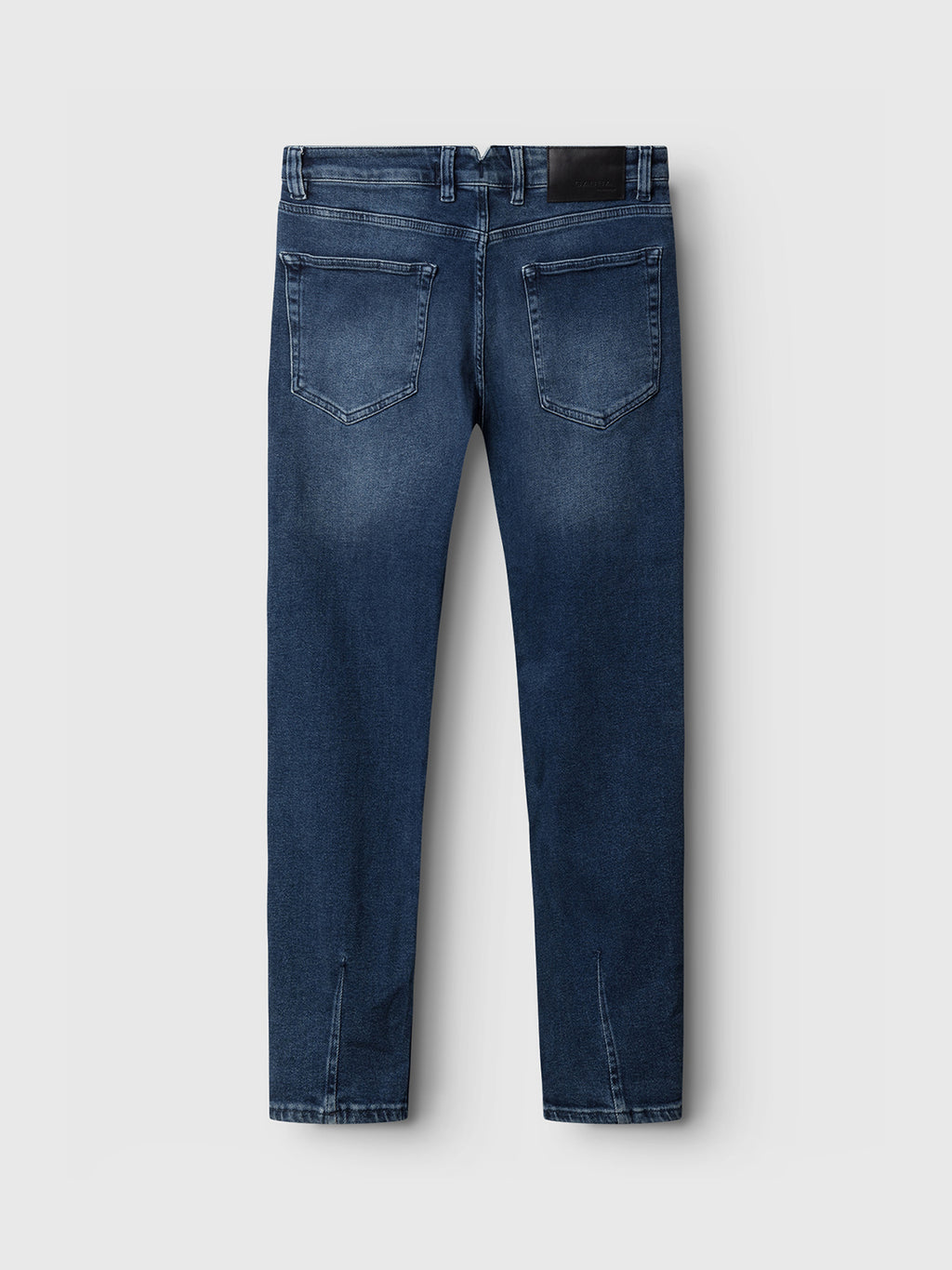 The GABBA Alex K3868 Jeans in denim wash are displayed from the back on a white background, showcasing a casual style with slightly faded texture, two back pockets, and a black label on the worker-cut waistband.