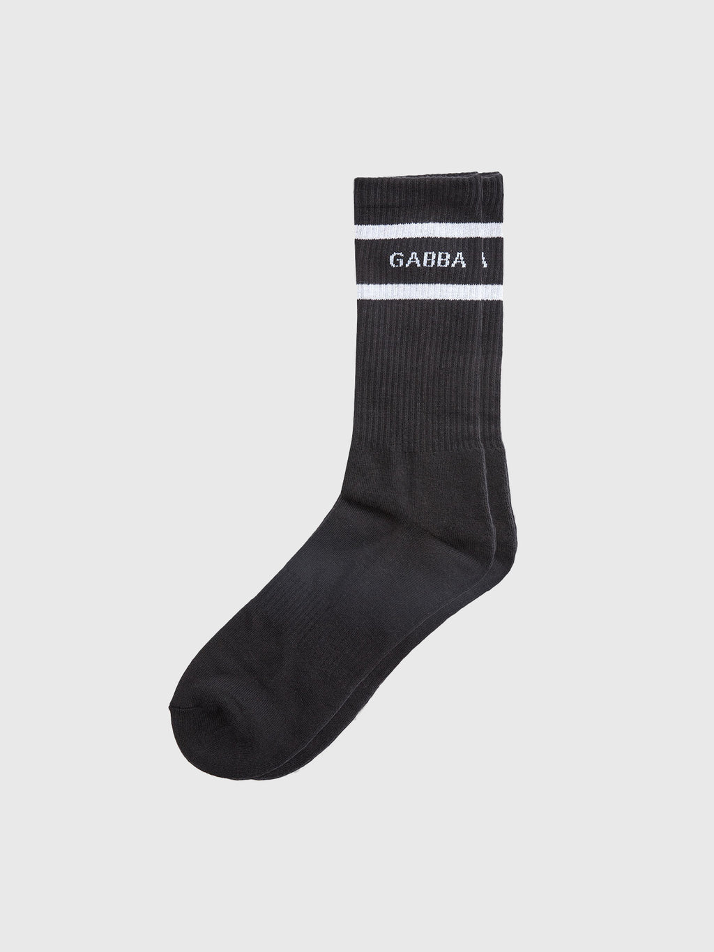 The Loris Socks - Black by Gabba feature a comfortable fit with two white stripes near the top and GABBA printed between them, making it a standout piece in Gabbas collection. Displayed against a plain white background, theyre perfect for daily wear.