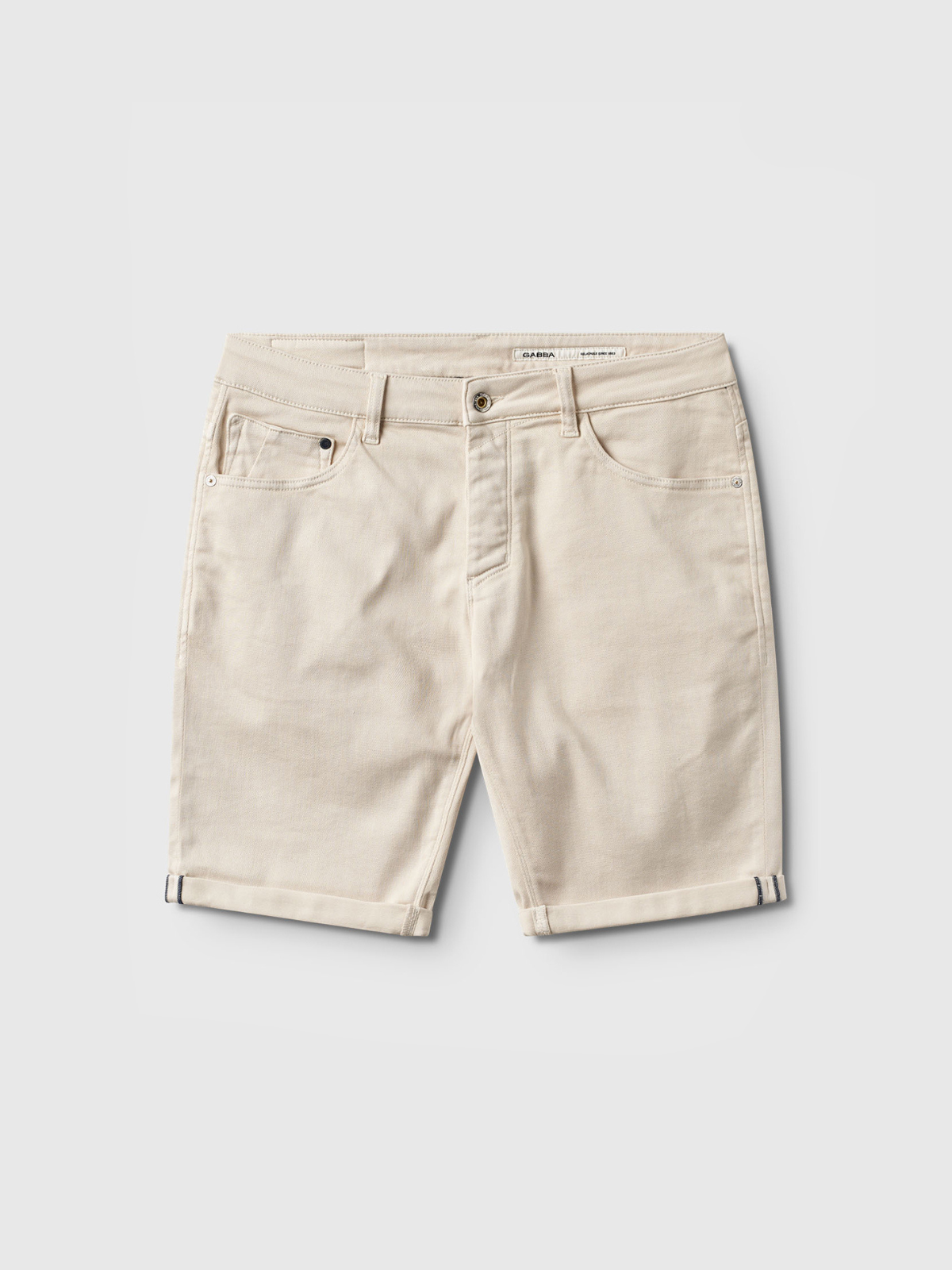 The Gabba Jason K3995 SANZA Shorts in Birch are beige denim, made from super stretch fabric with reinforced pockets, a button and zip closure, and a straight, above-the-knee cut, shown on a plain white background.