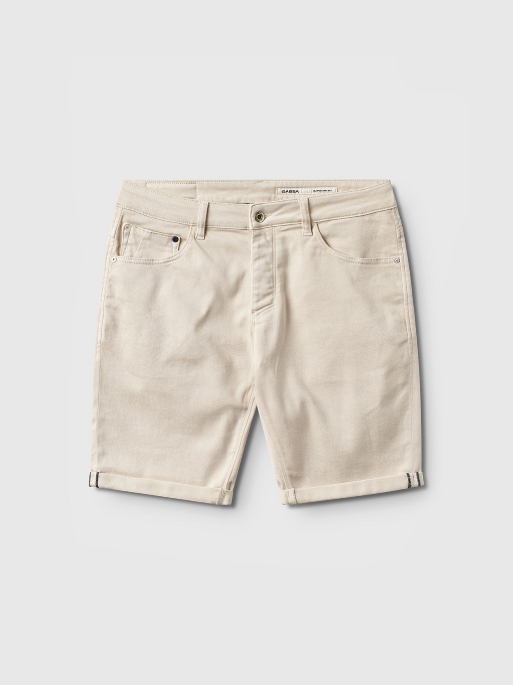 The Gabba Jason K3995 SANZA Shorts in Birch are beige denim, made from super stretch fabric with reinforced pockets, a button and zip closure, and a straight, above-the-knee cut, shown on a plain white background.