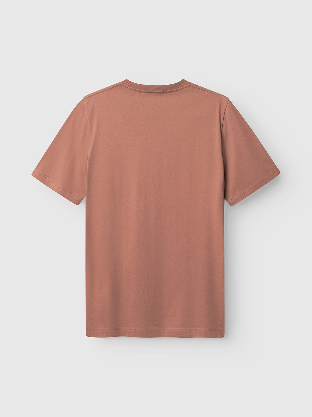 The Gabba GABdune Logo SS GOTS t-shirt in Wood Pink is shown laid flat, back up, on a light gray background, highlighting its classic fit and sustainable organic cotton style.