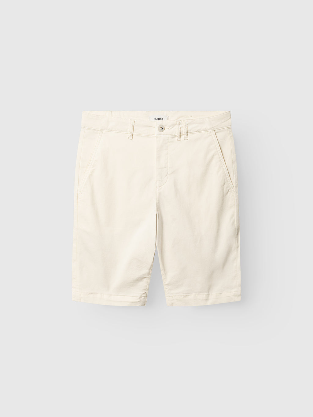 The Gabba GABjet K3280 Dale Shorts in white feature a relaxed fit, side pockets, and button closure, crafted from textured fabric. Shown against a light gray background, they’re ideal for everyday wear.