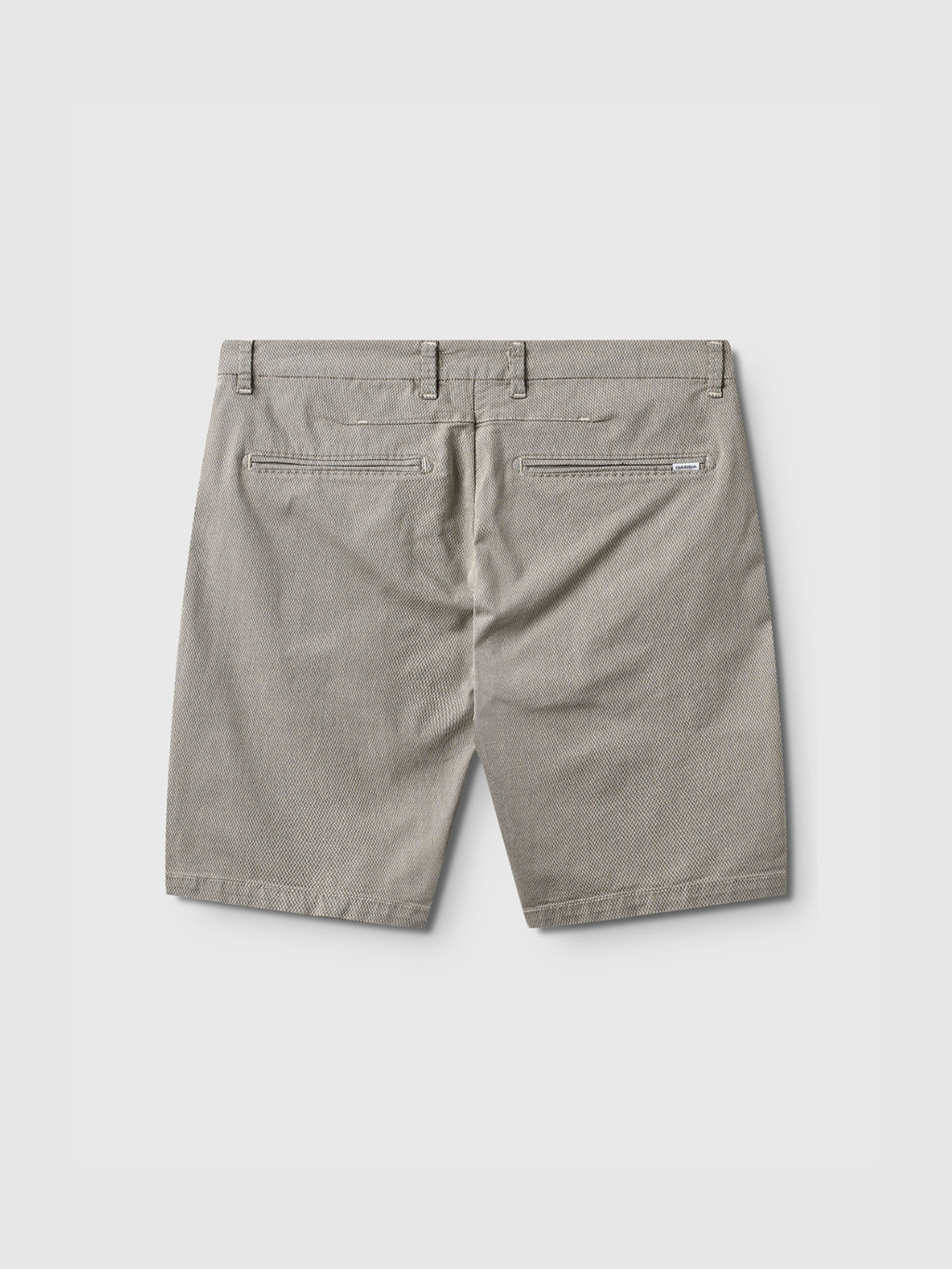 Back view of Gabba Jet K3280 Dale Shorts in Birch, featuring belt loops, two back zipper pockets, and a subtle textured pattern for modern style, shown on a plain white background.