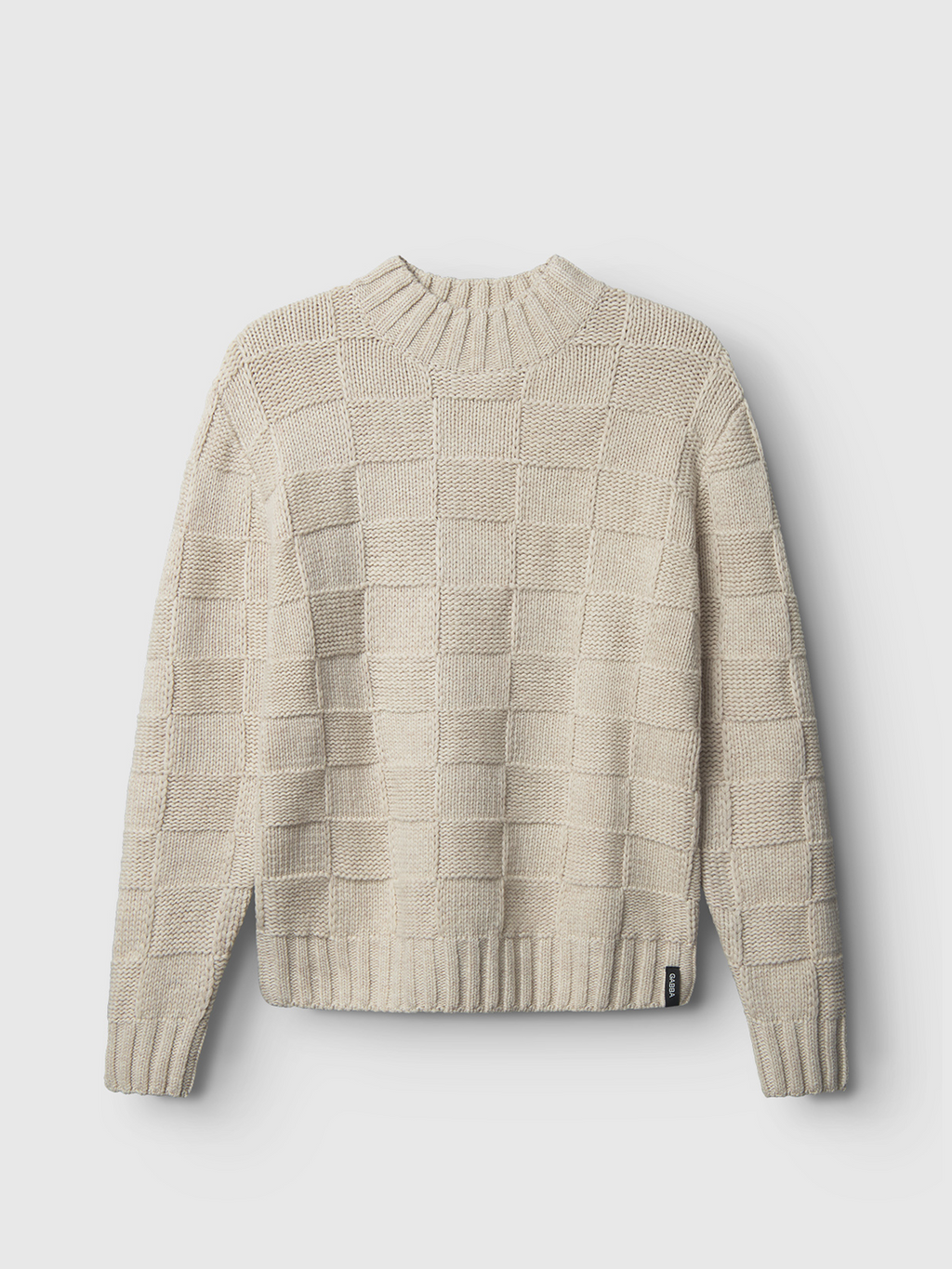 The Gabba Livio Ls - Sand Cashmere sweater, made with a luxurious blend and grid pattern, is displayed against a light background. It features ribbed collar, cuffs, and hem with a small black fabric tag on the bottom hem.