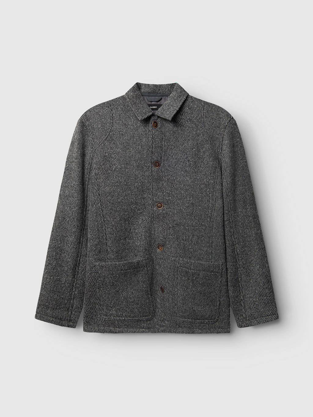 The Oscar J Diag - Grey Mel by Gabba is a stylish gray herringbone-patterned overcoat made from a wool-blend fabric, featuring a button-up front and two large pockets. Set against a plain light gray background, this piece merges style and comfort effortlessly.