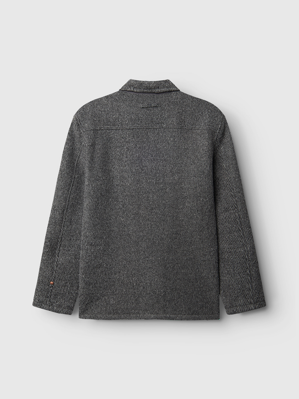 The Oscar J Diag - Grey Mel by Gabba is a back view of a button-up wool-blend jacket in light gray, featuring long sleeves and a subtle textured pattern for a clean, simple look.