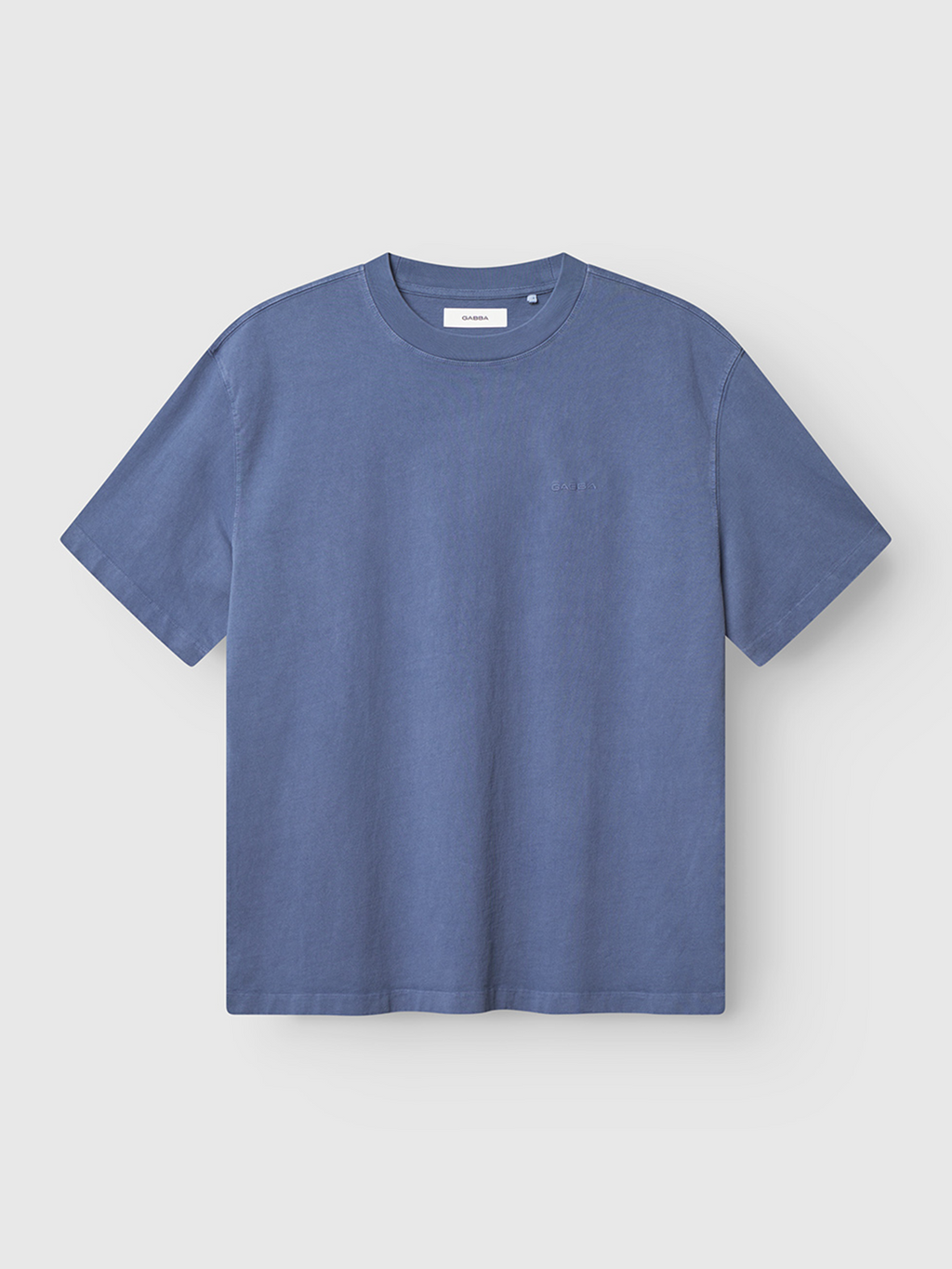 The Gabba Nigel Wix Boxy Hour SS is a heavyweight cotton, short-sleeved crew-neck t-shirt in vintage indigo, shown flat on a light gray background.