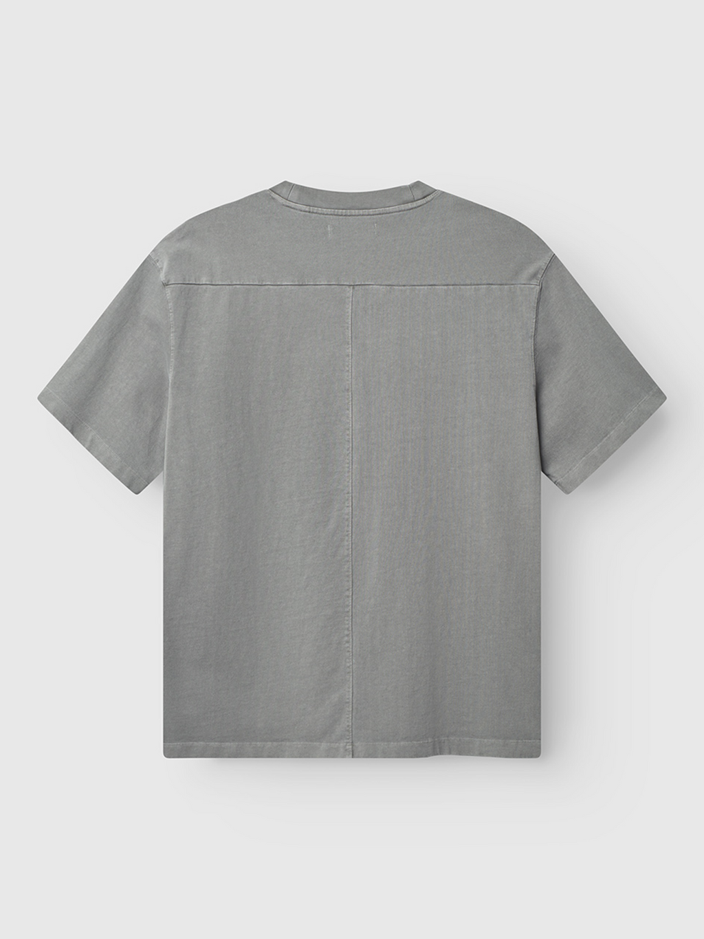 The Gabba Nigel Wix Boxy Hour SS in Dust Sage Green is a heavyweight, short-sleeve cotton t-shirt with a boxy fit, straight hem, center seam detail, and vintage texture, shown from the back on a white background.
