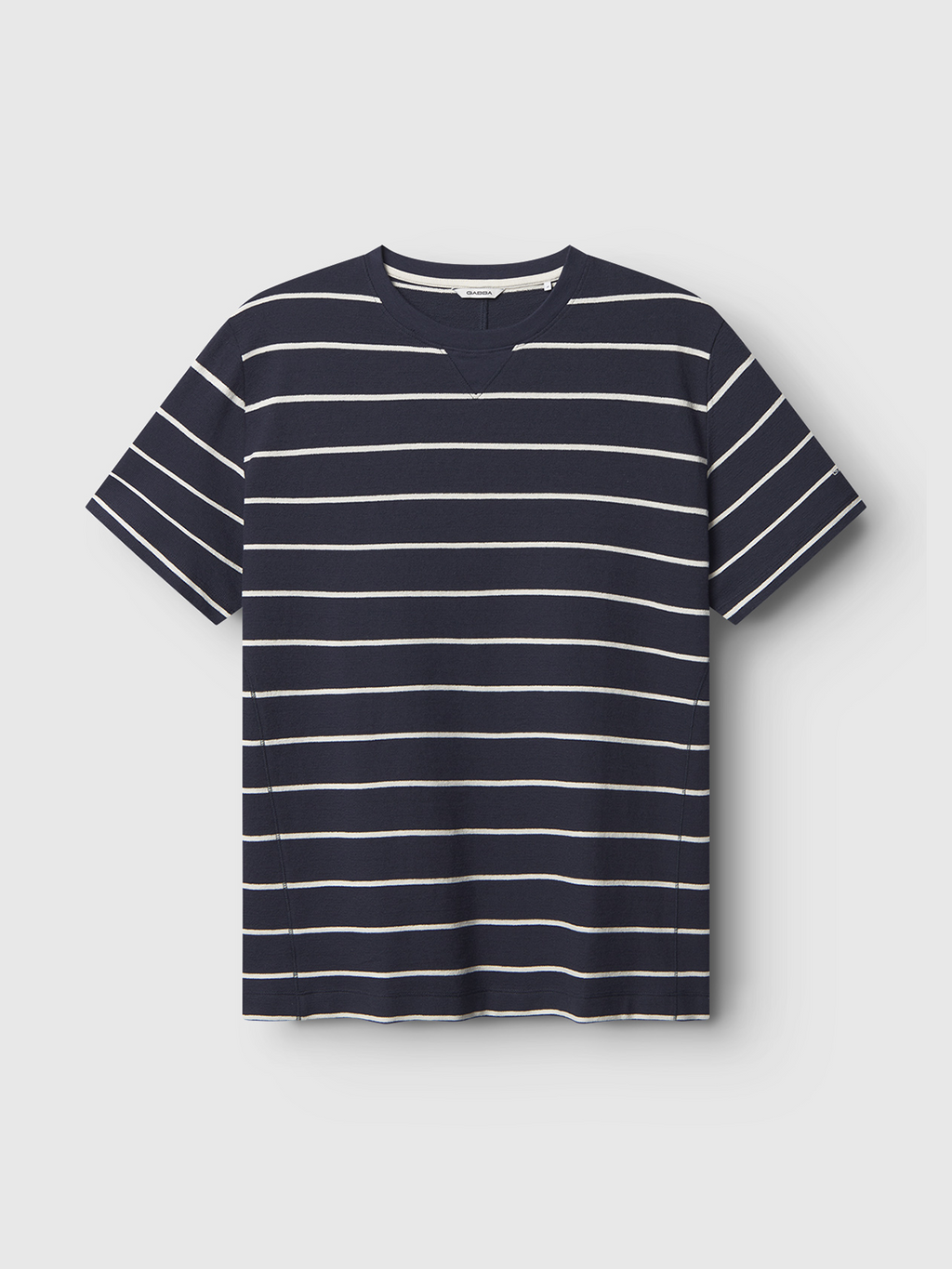 The Gabba Dune Crepe Stripes SS GOTS - Navy Stripe is a V-neck short-sleeve t-shirt in navy blue with white horizontal stripes, shown against a plain light gray background.