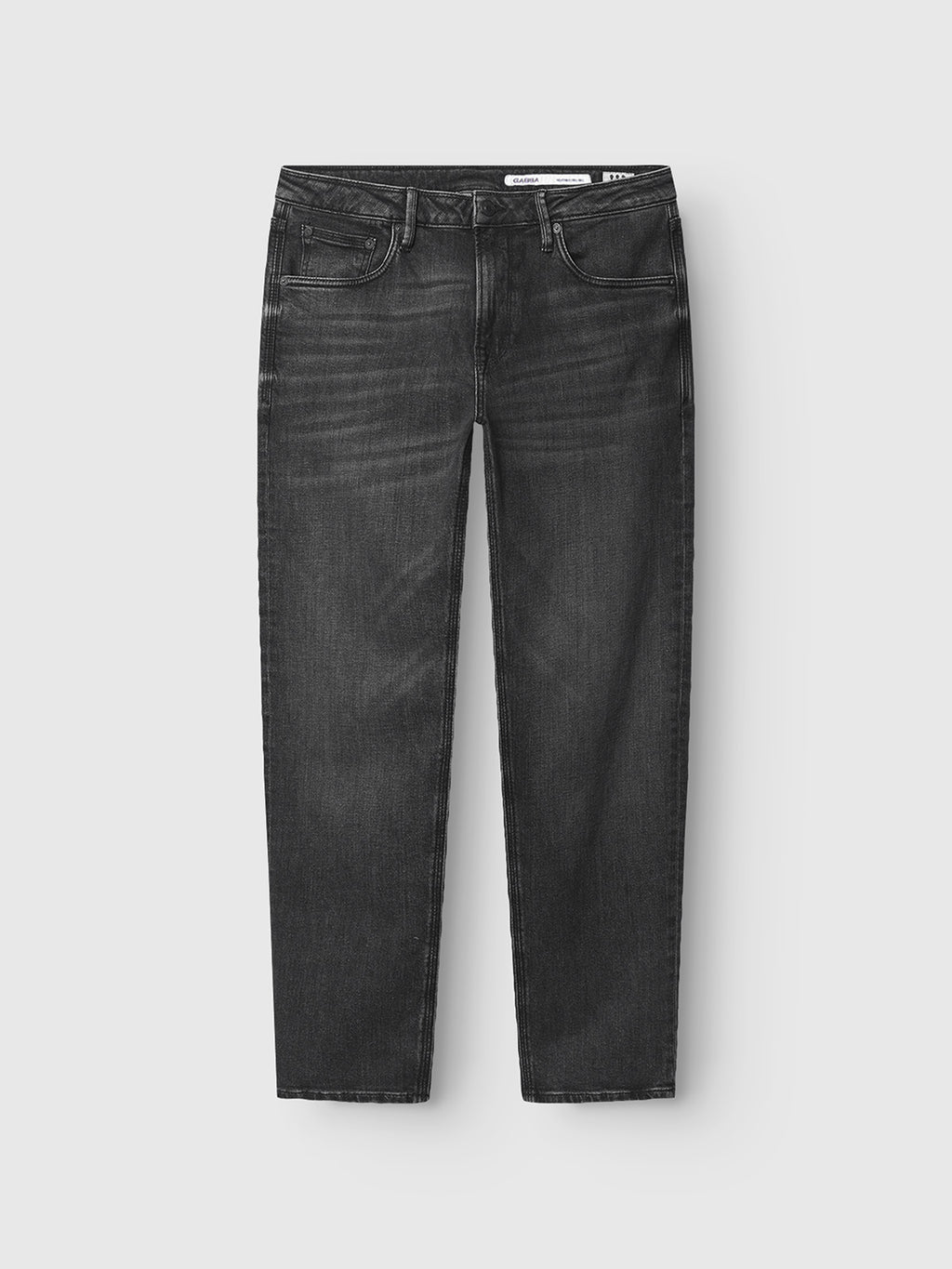 Gabba’s Carl Dlak - Black Denim: straight-leg, mid-rise jeans in faded black with a vintage feel, five pockets, and belt loops, displayed flat on a light gray background.