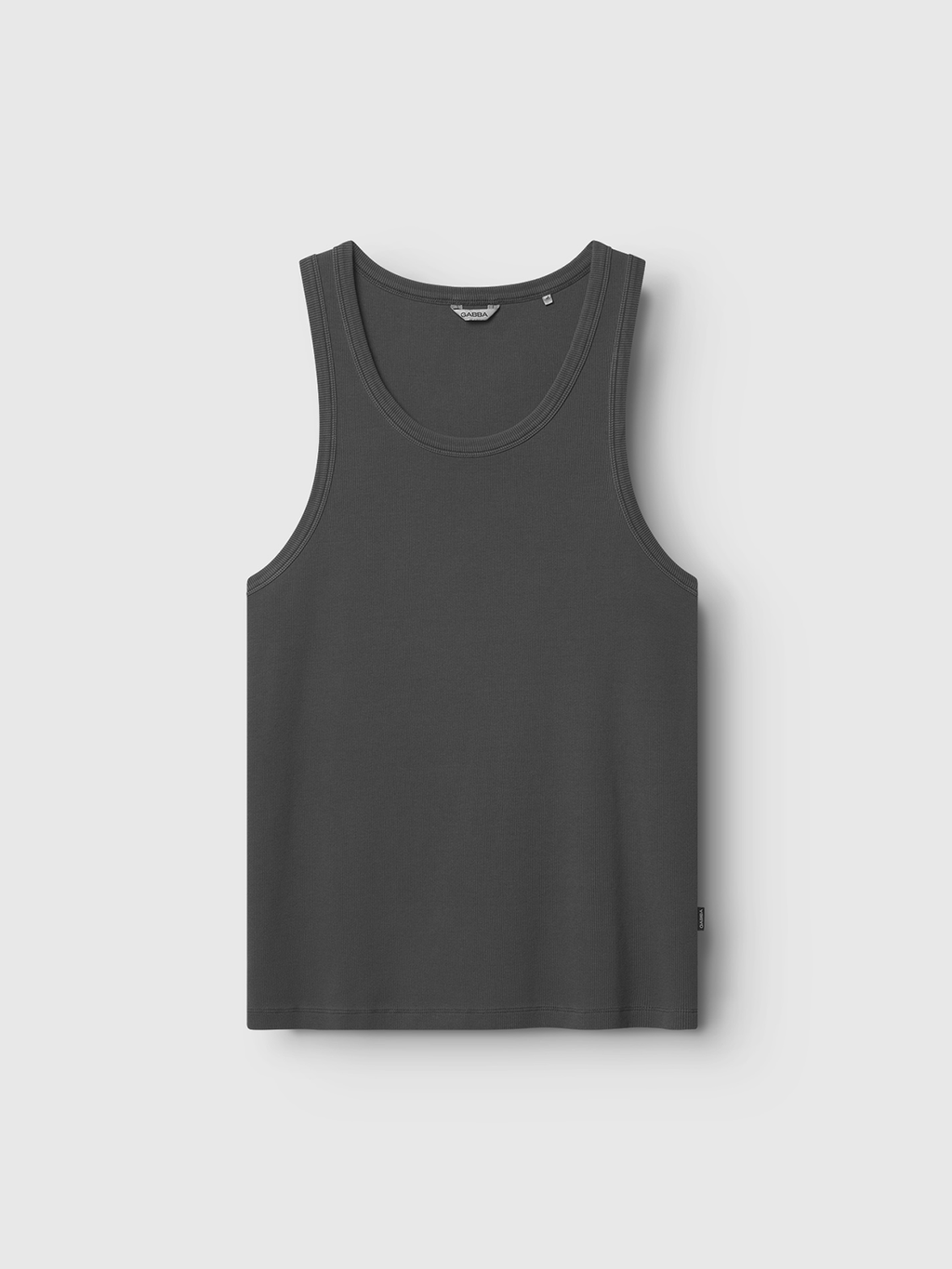 The Gabba Orsen - Dark Grey tank top, made from soft cotton with a scoop neckline and small left seam tag, is laid flat to show its sleeveless front design—ideal for breezy summer days.